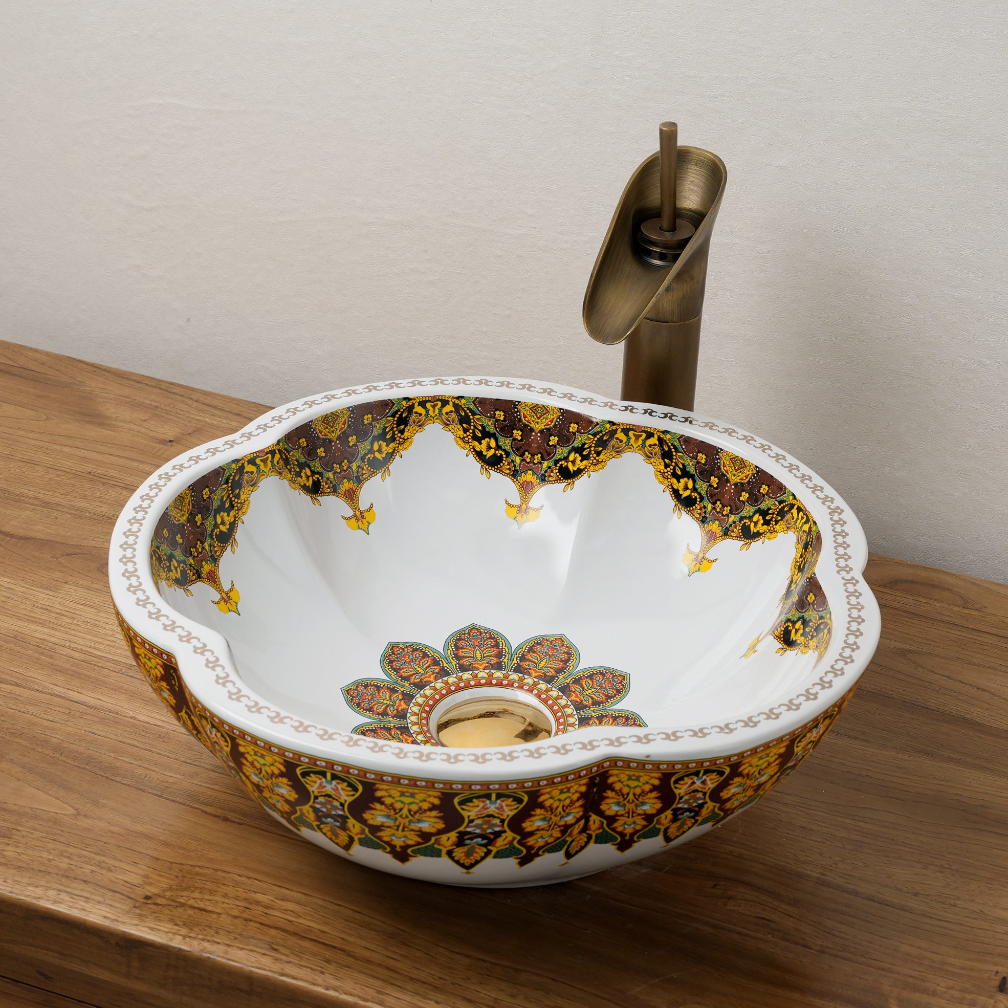 Ceramic washbasin with a yellow and white floral print