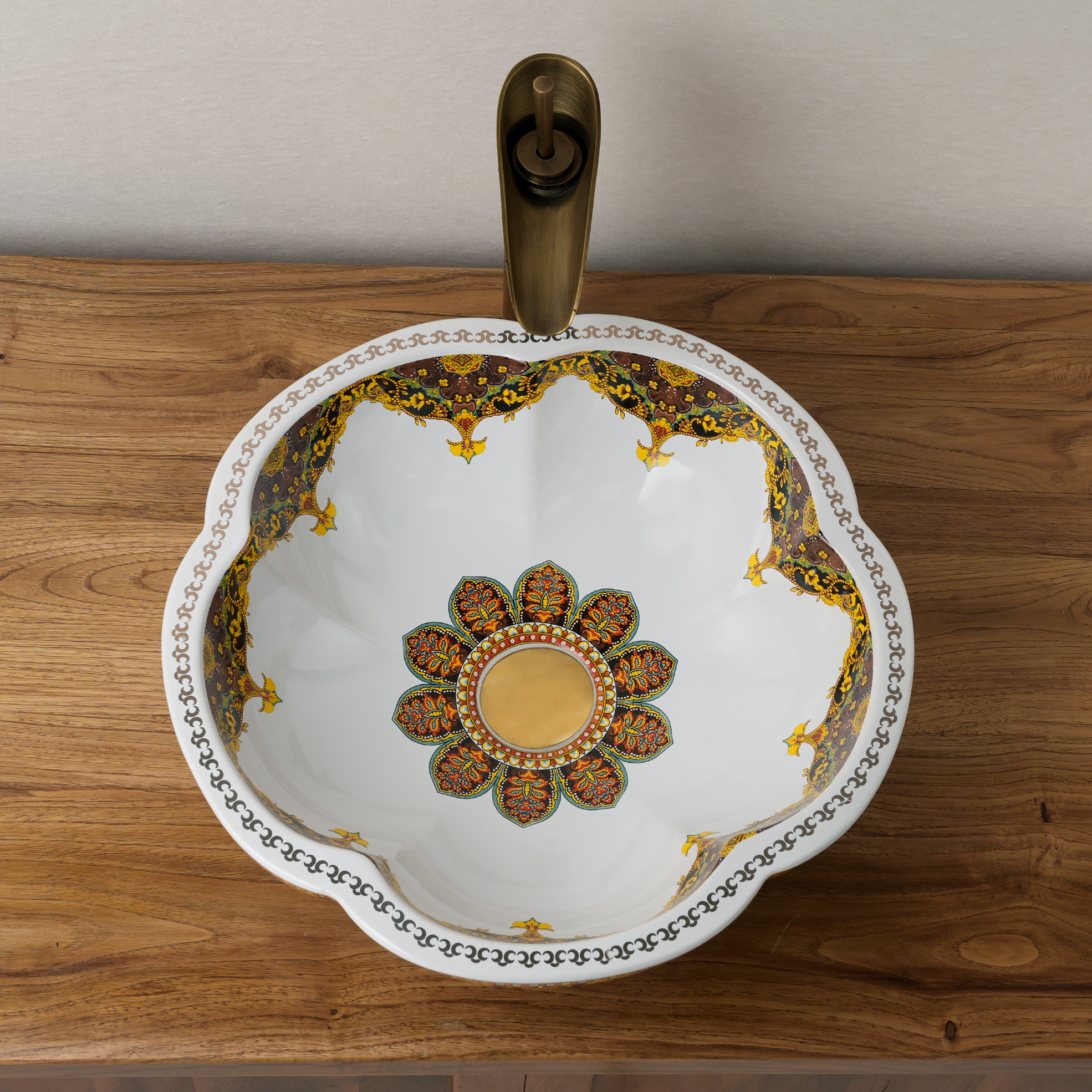 Ceramic washbasin with a yellow and white floral print