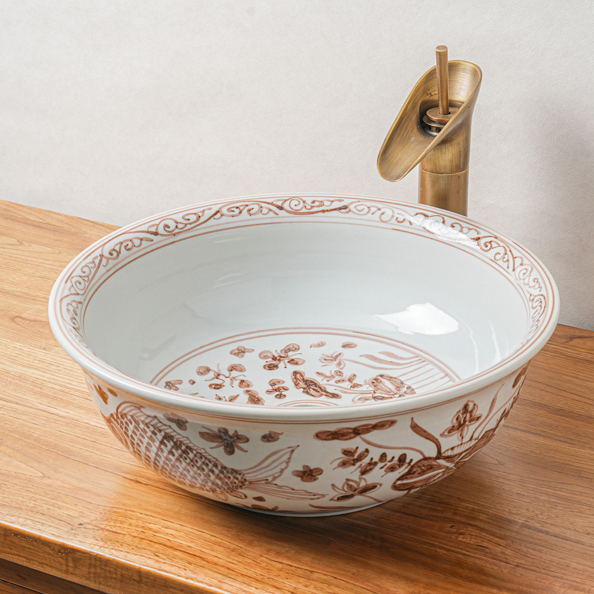 Round hand-painted ceramic washbasin