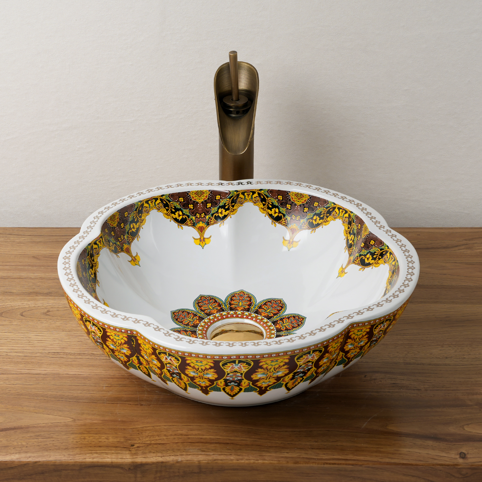 Ceramic washbasin with a yellow and white floral print
