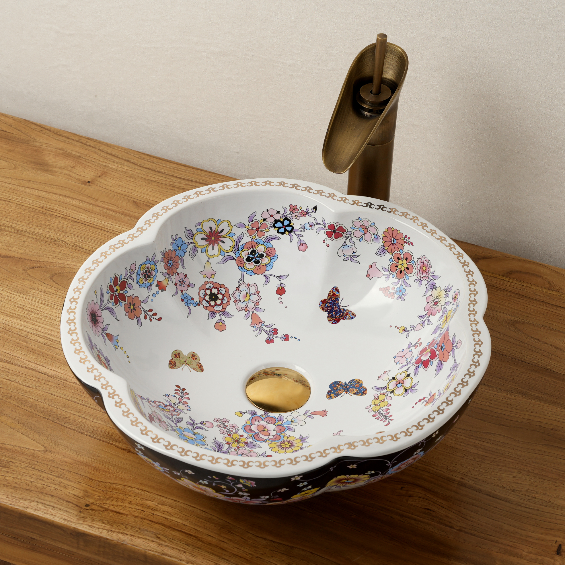 Ceramic washbasin with black and white floral print