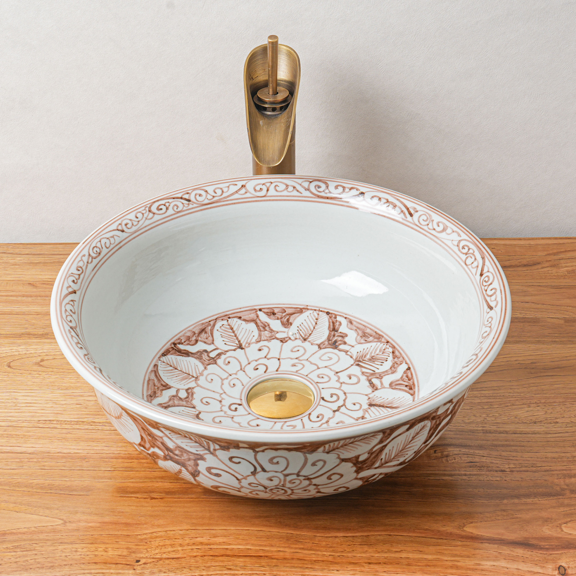 Round hand-painted ceramic washbasin