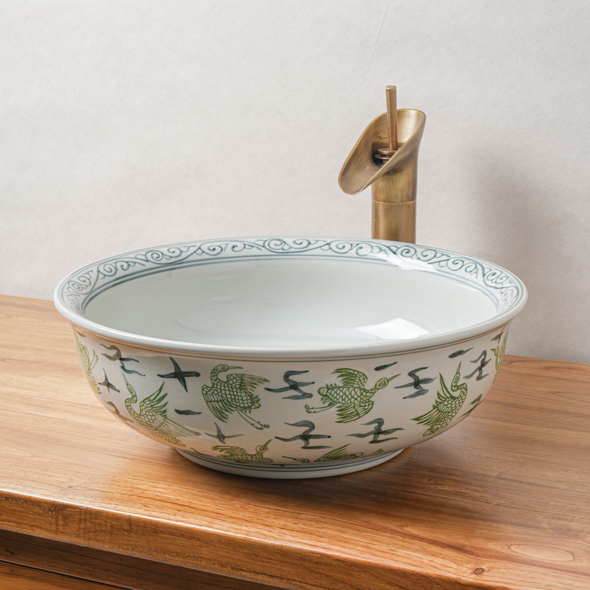 Round hand-painted ceramic washbasin