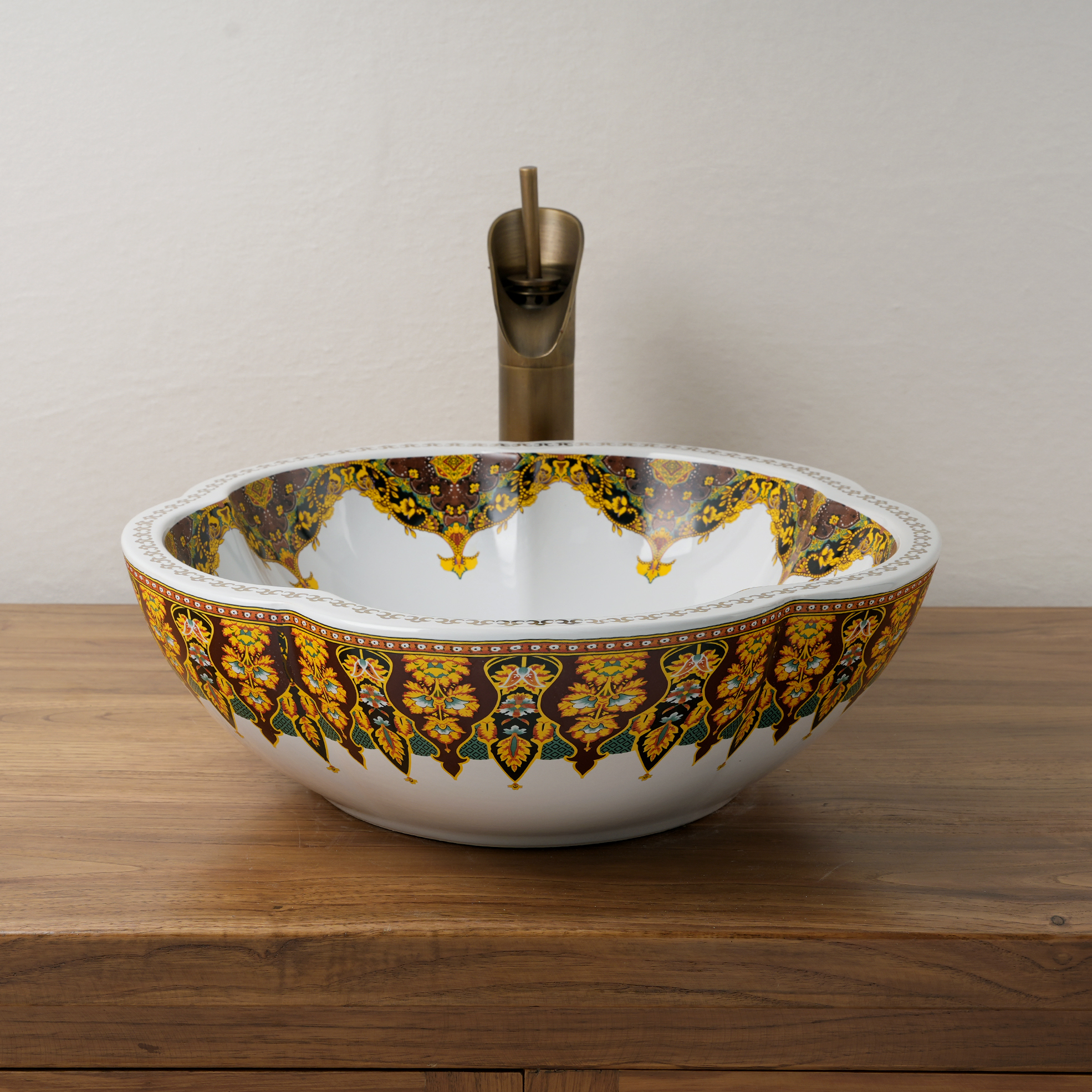 Ceramic washbasin with a yellow and white floral print