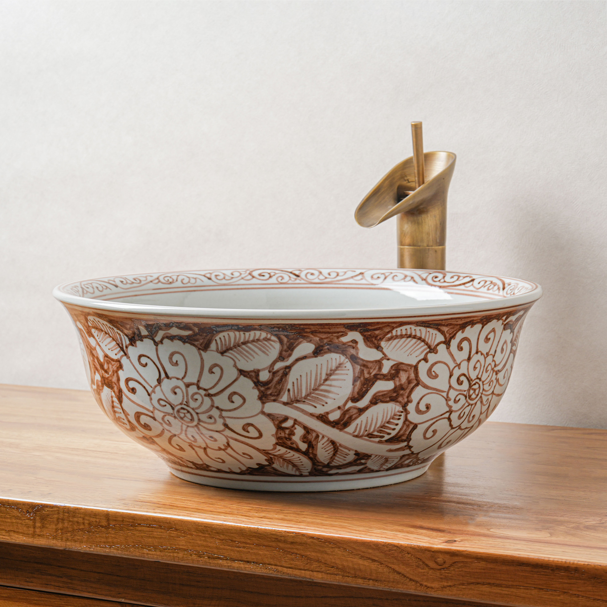 Round hand-painted ceramic washbasin