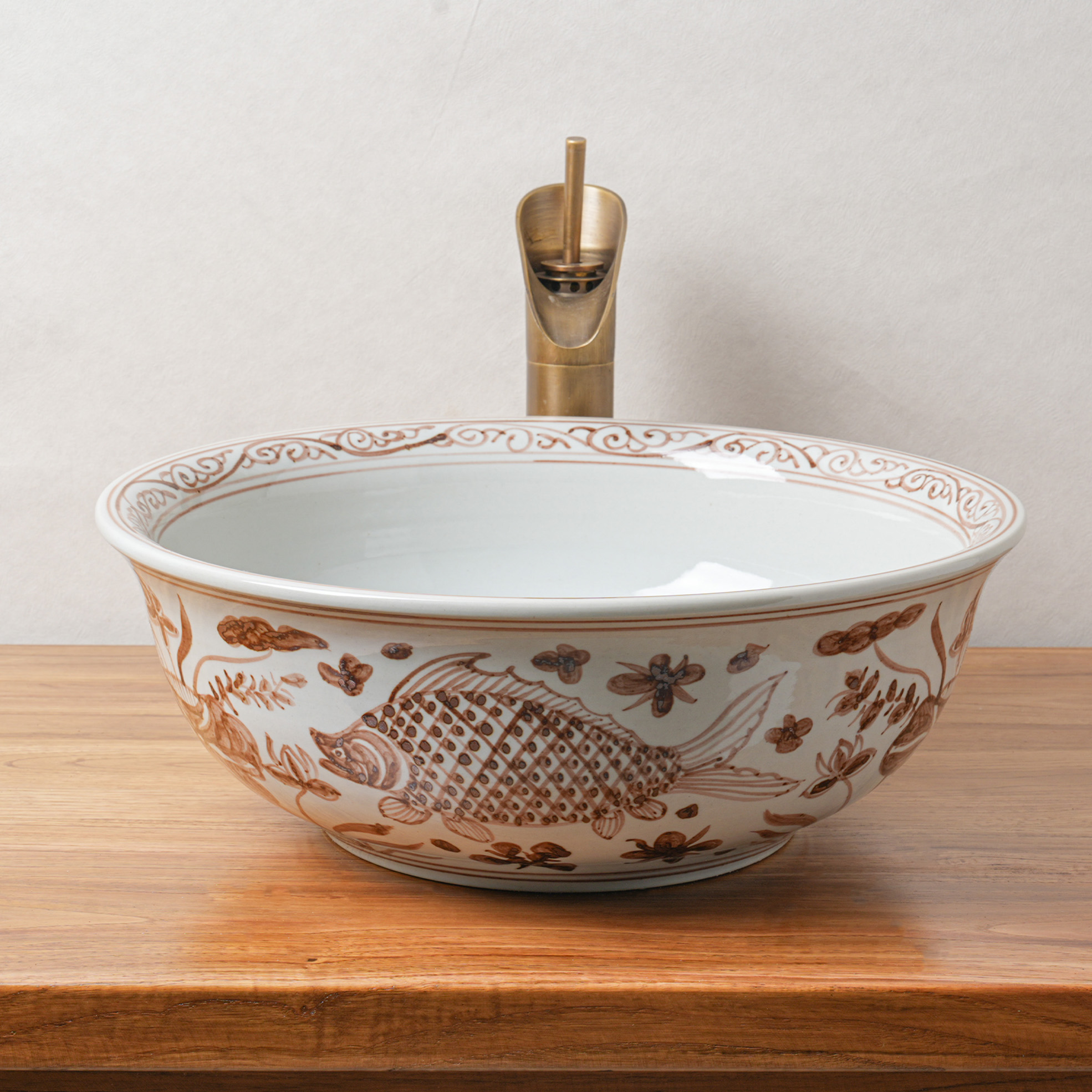 Round hand-painted ceramic washbasin