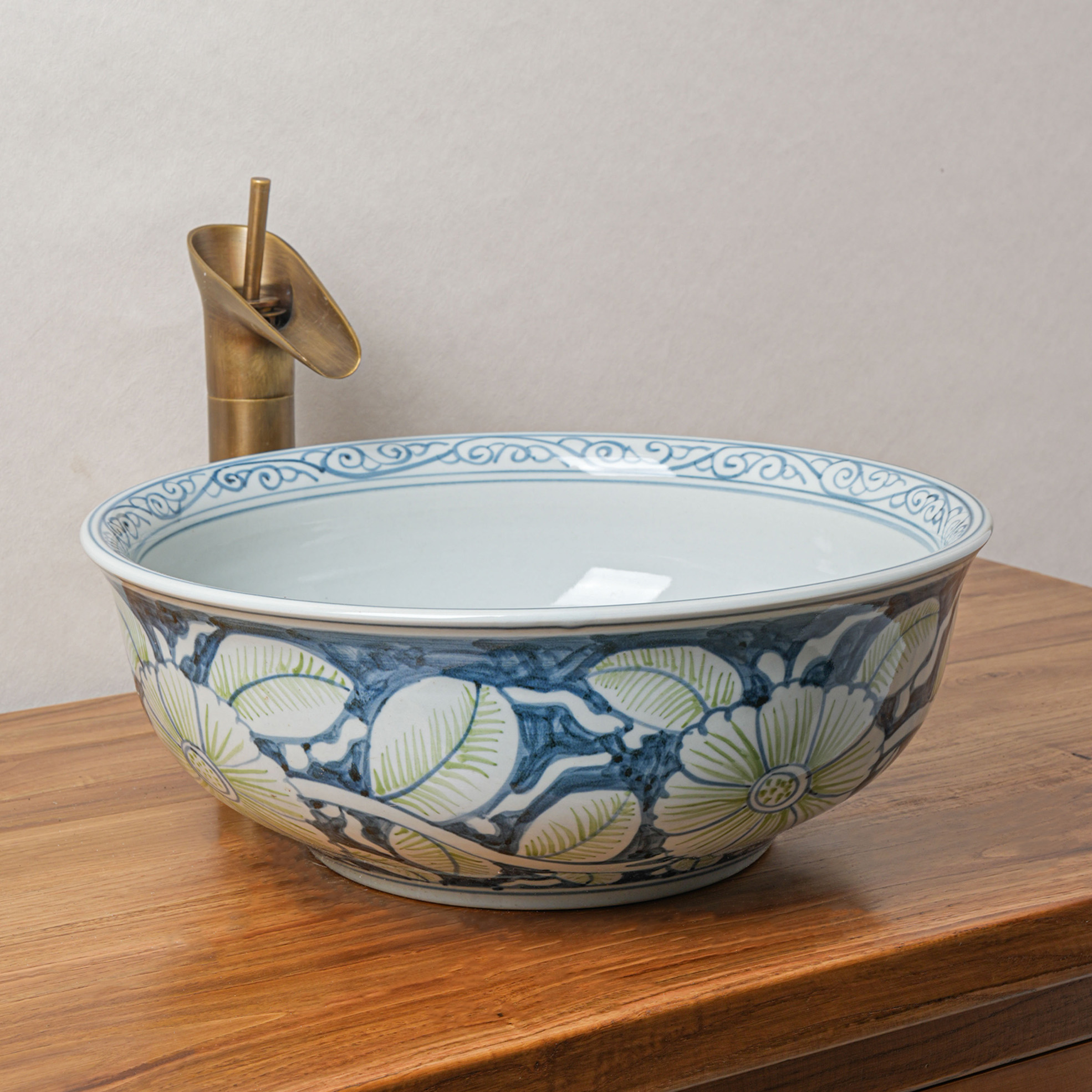 Round hand-painted ceramic washbasin