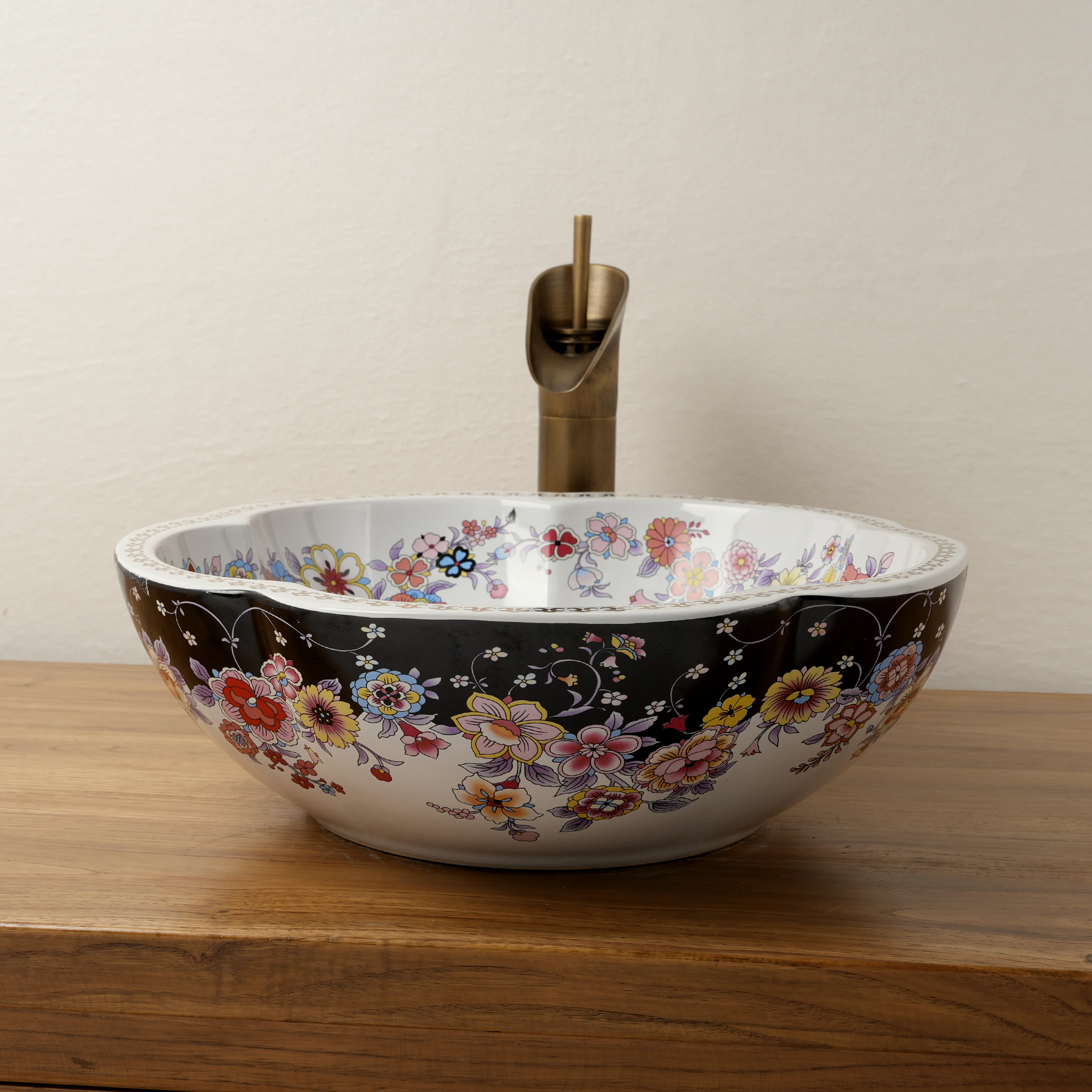 Ceramic washbasin with black and white floral print
