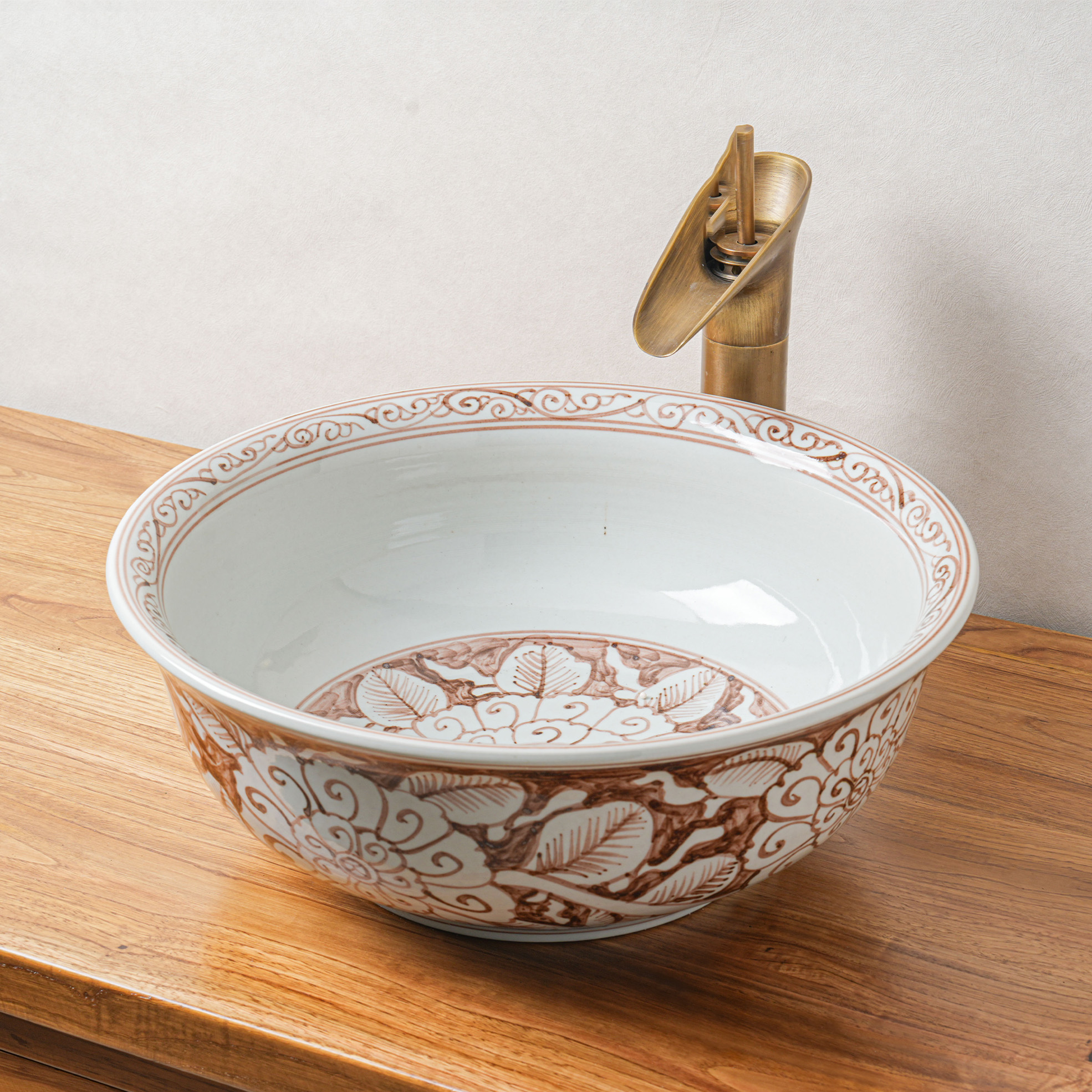 Round hand-painted ceramic washbasin