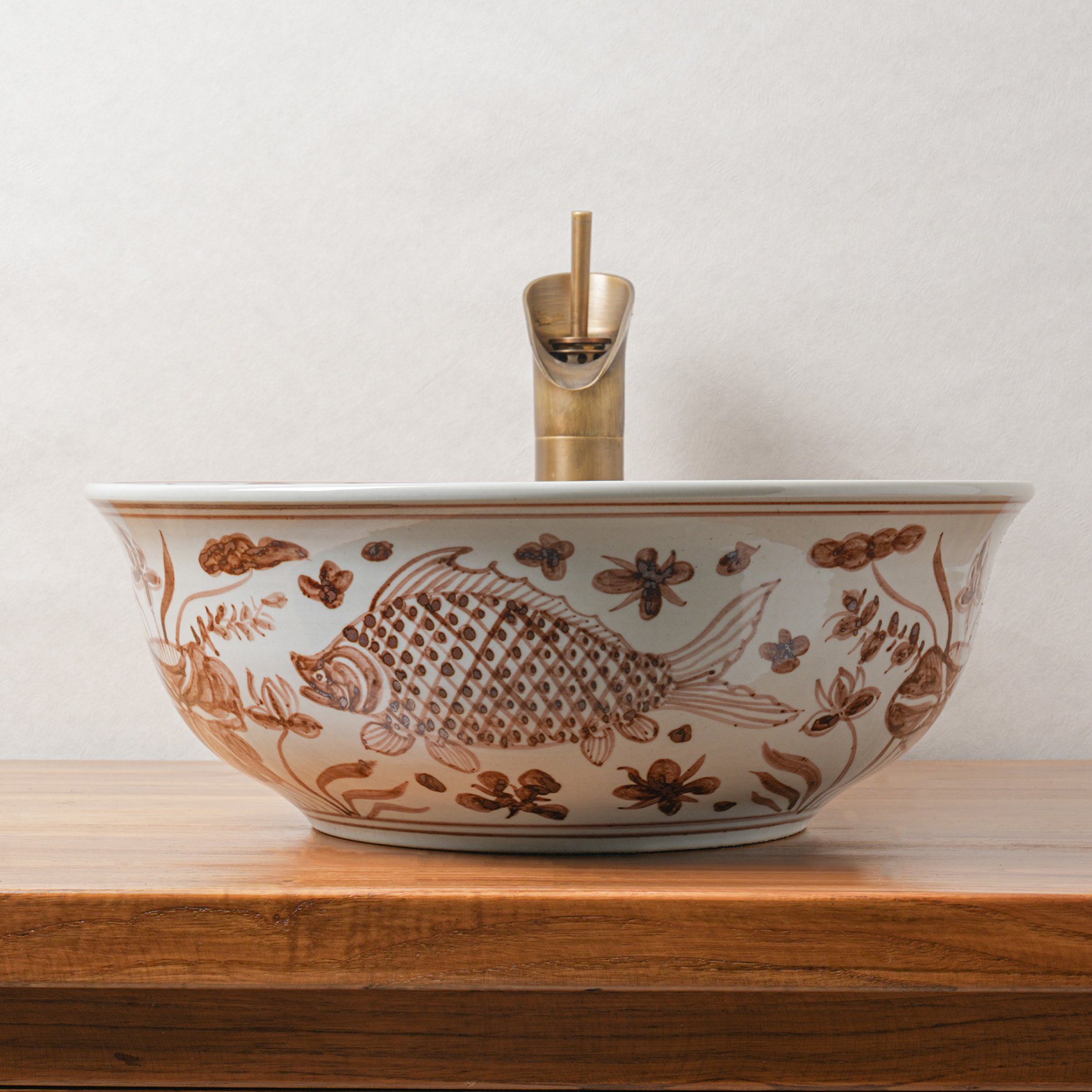 Round hand-painted ceramic washbasin