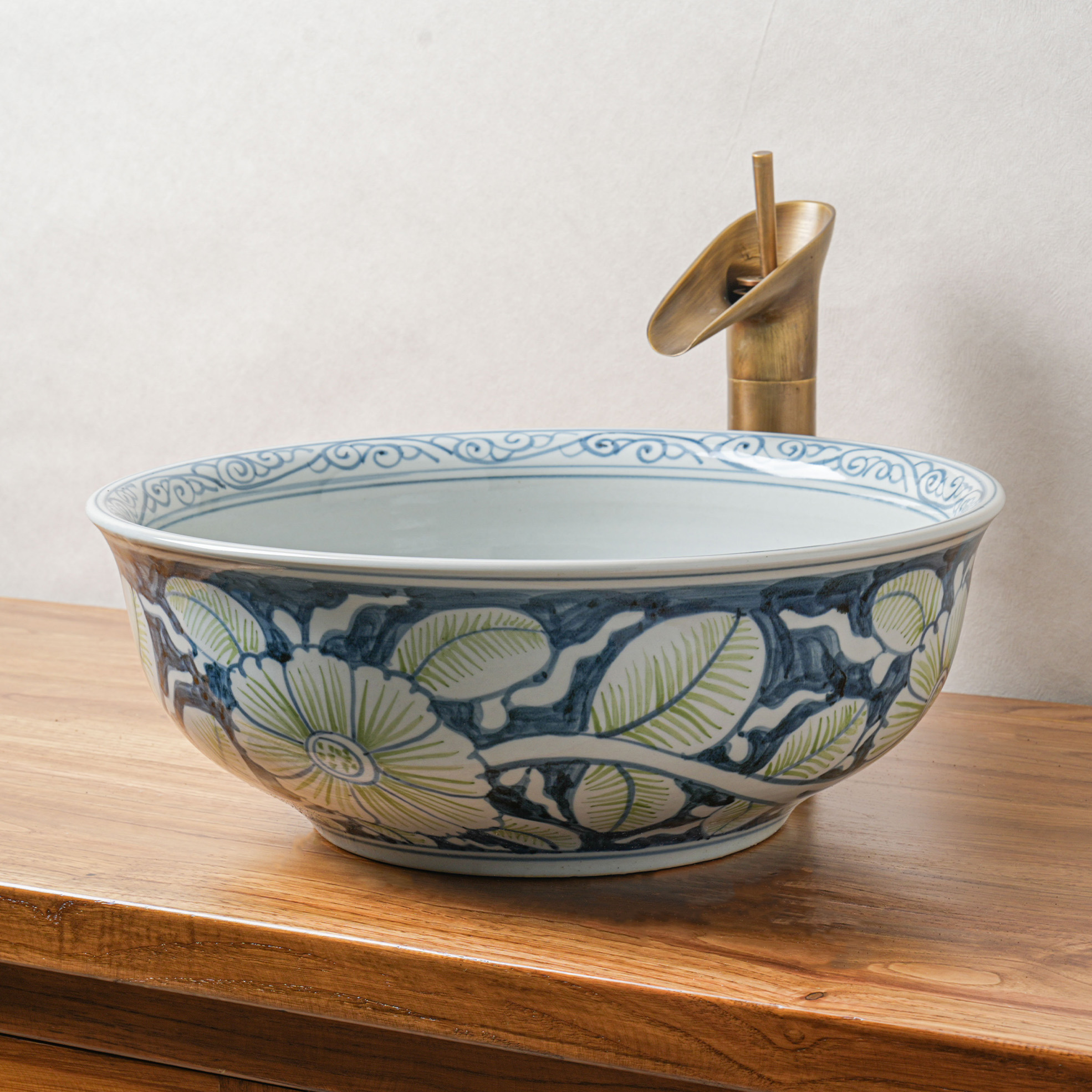 Round hand-painted ceramic washbasin