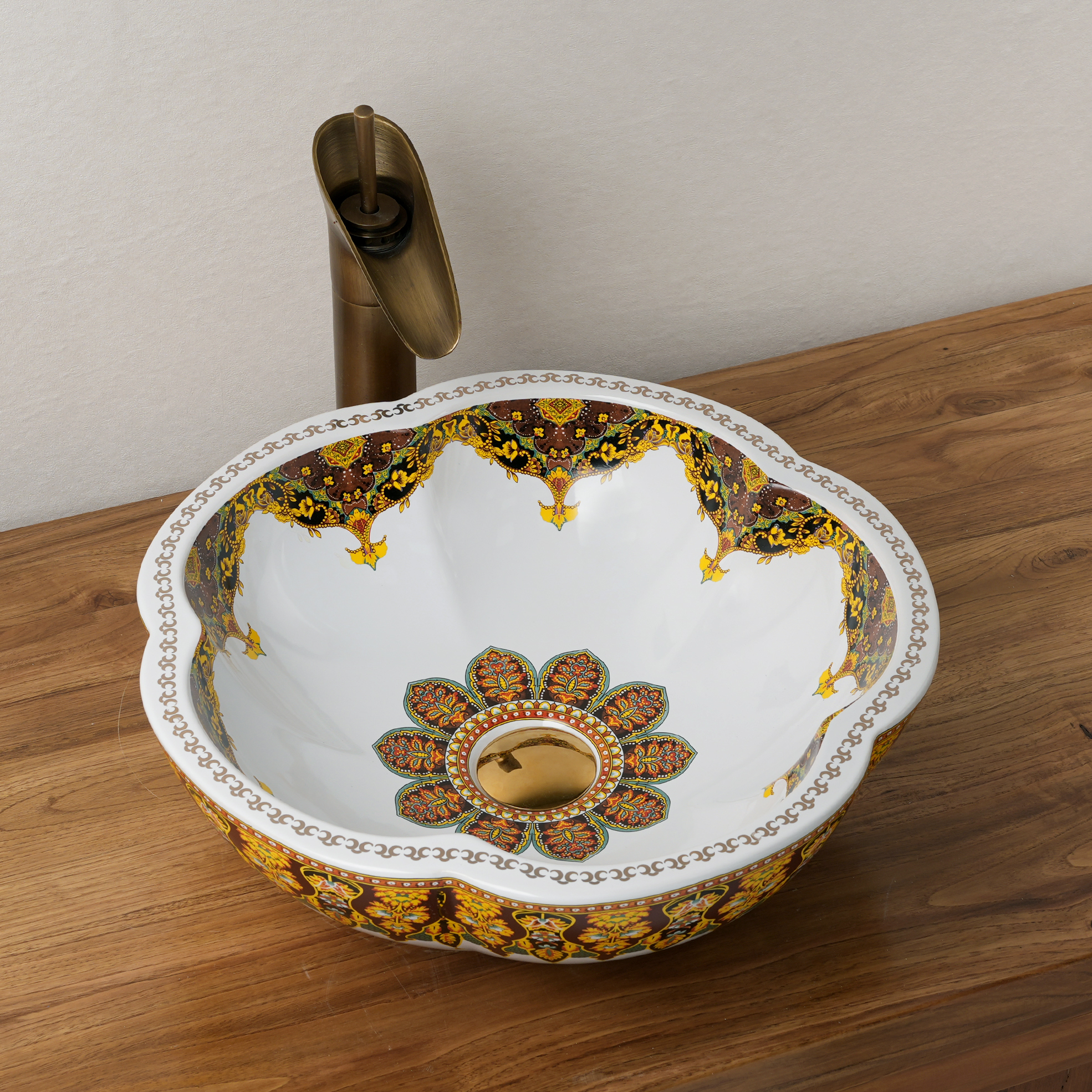 Ceramic washbasin with a yellow and white floral print