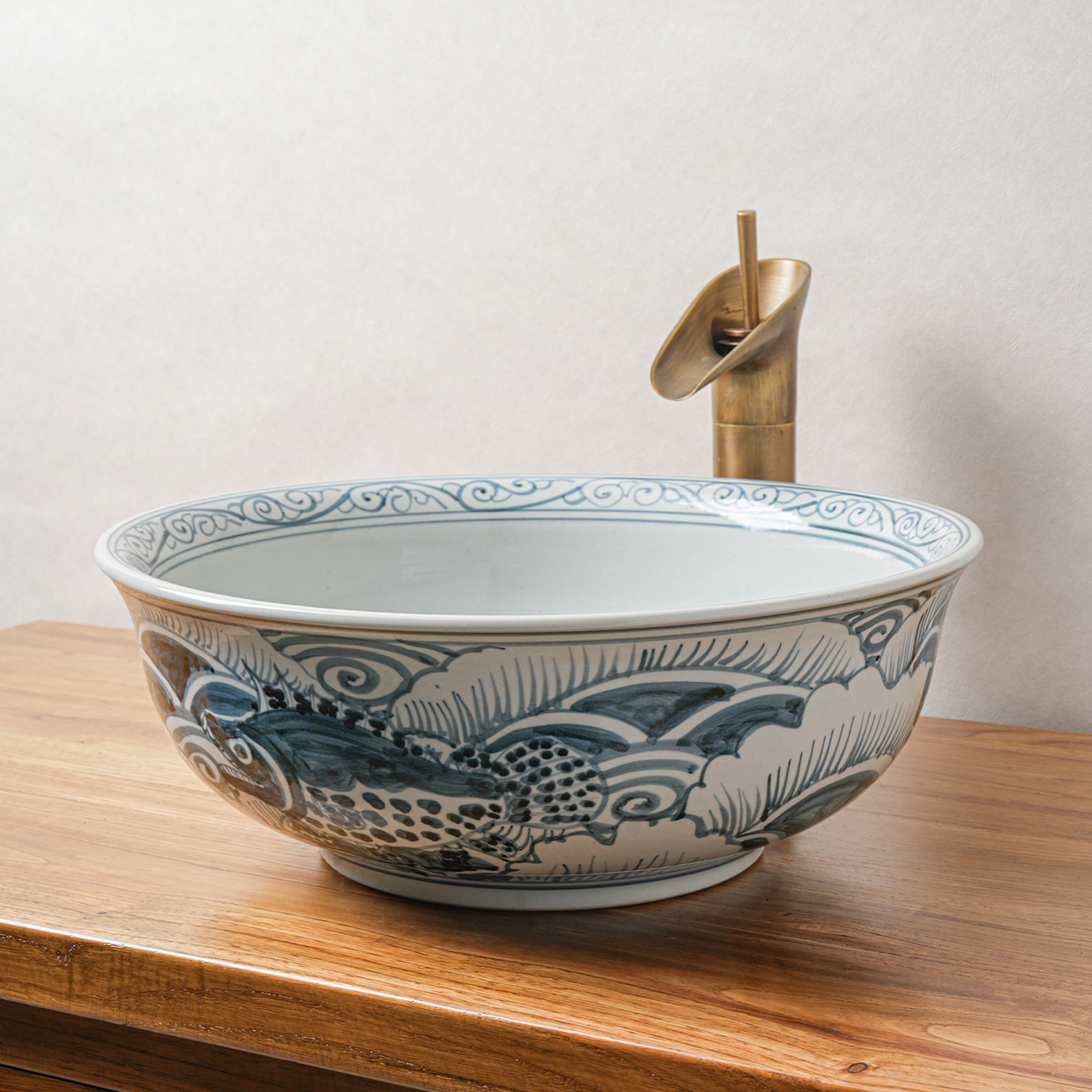 Round hand-painted ceramic washbasin