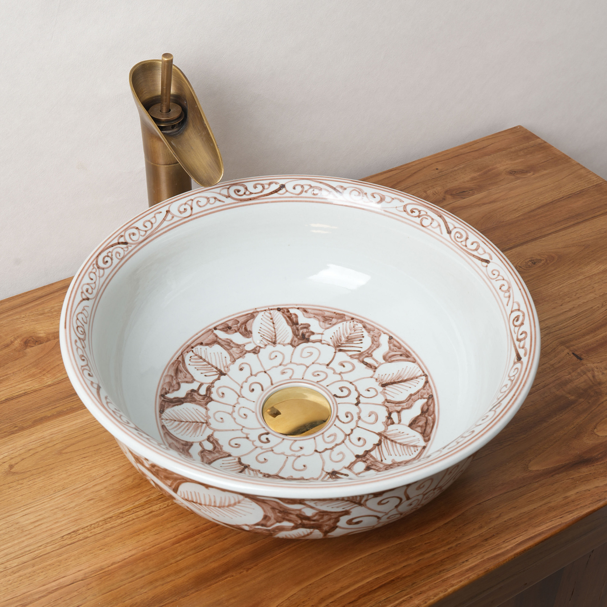 Round hand-painted ceramic washbasin