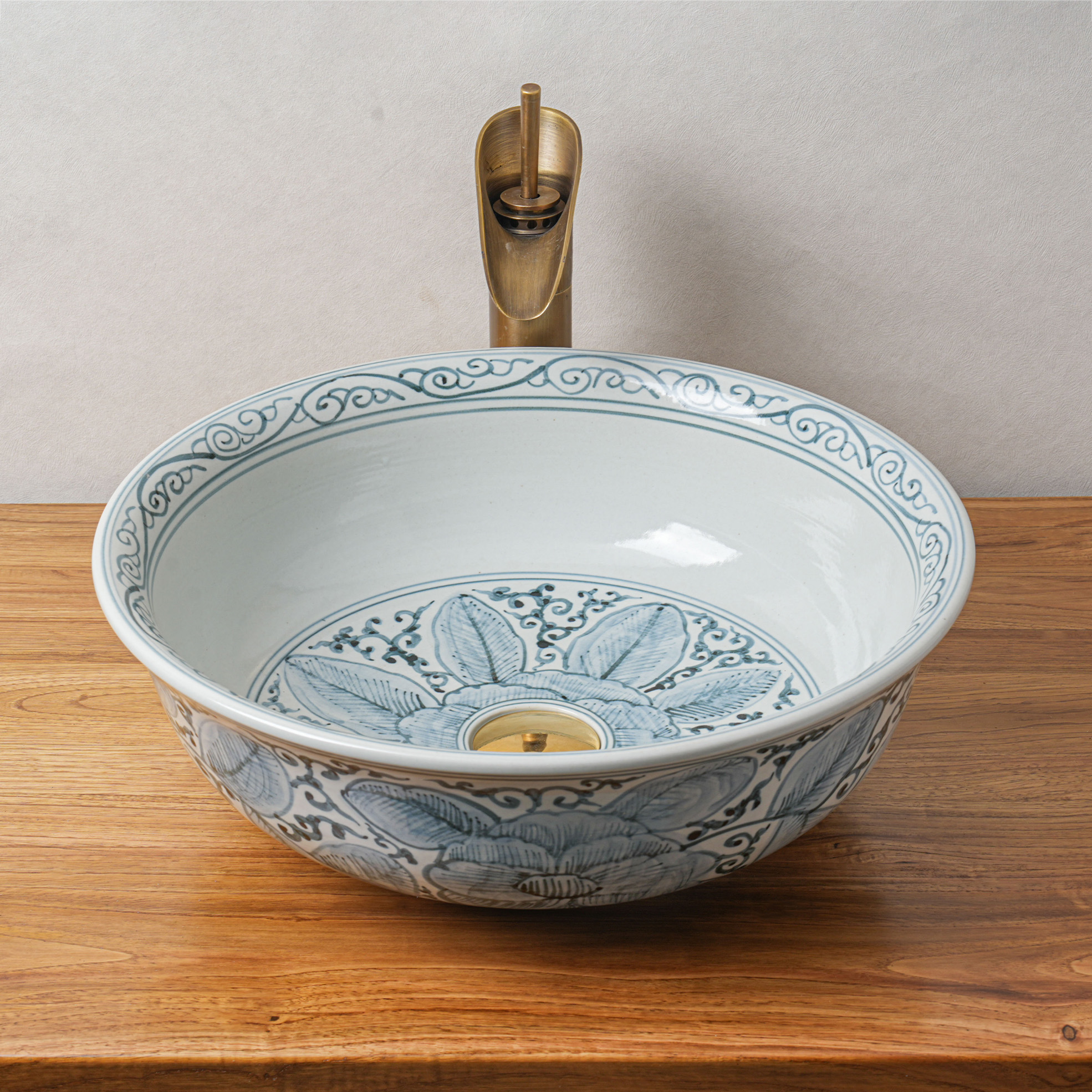 Round hand-painted ceramic washbasin