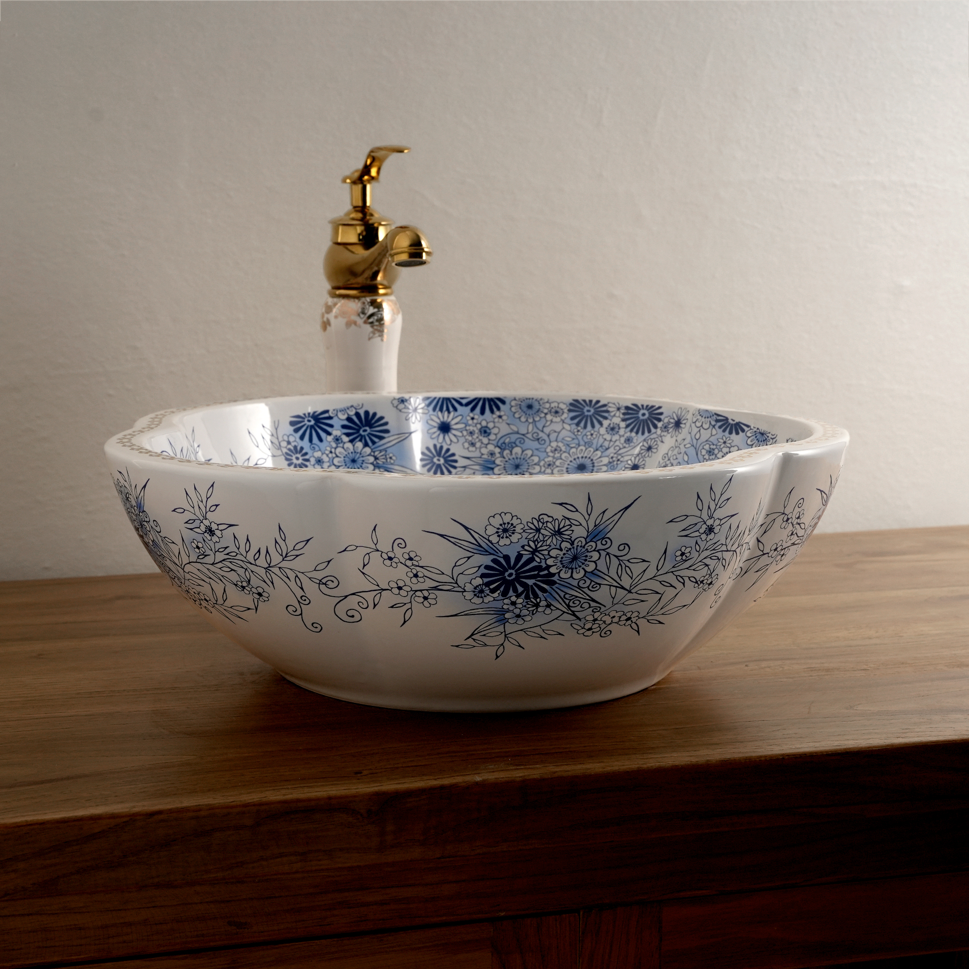 Ceramic washbasin with white petal print