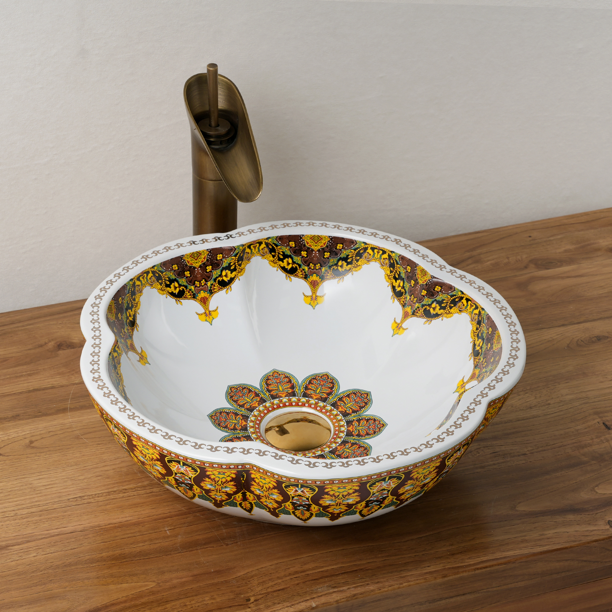 Ceramic washbasin with a yellow and white floral print