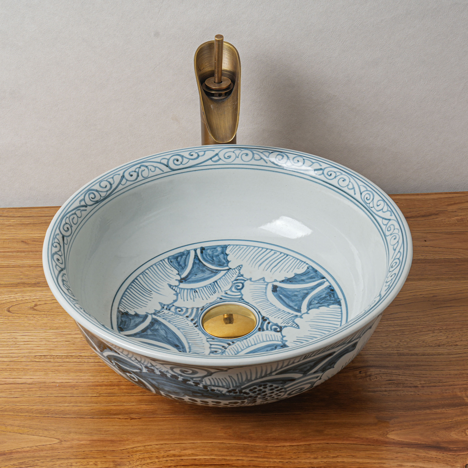 Round hand-painted ceramic washbasin