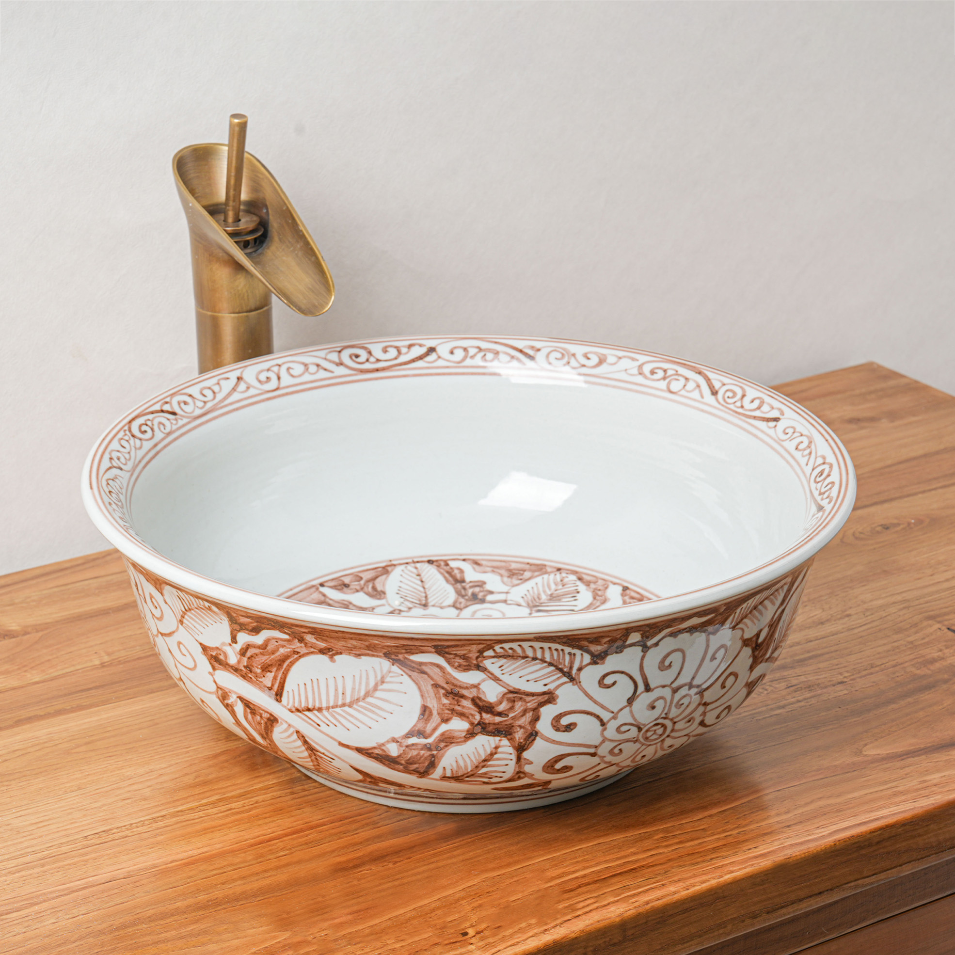 Round hand-painted ceramic washbasin