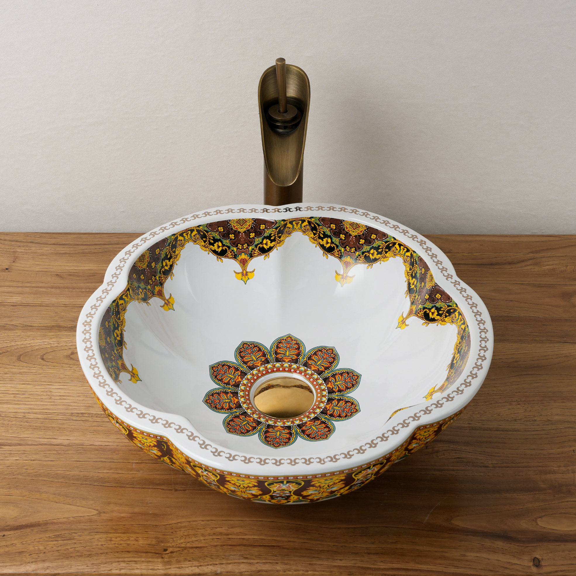 Ceramic washbasin with a yellow and white floral print