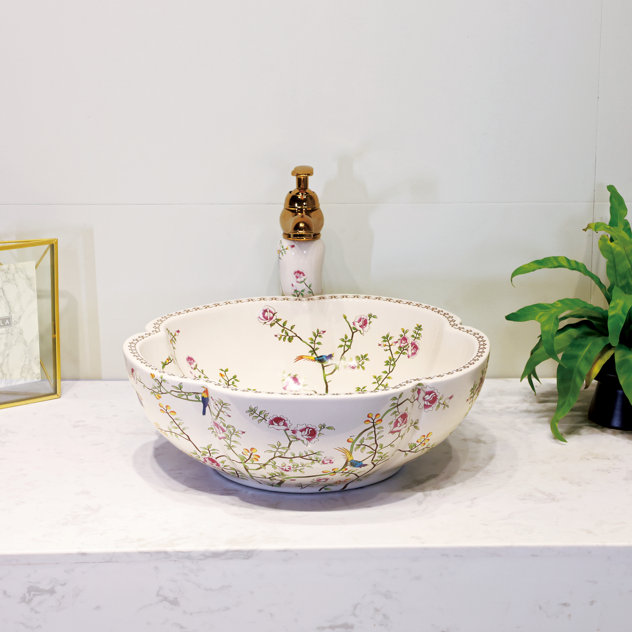 Ceramic washbasin with white petal print