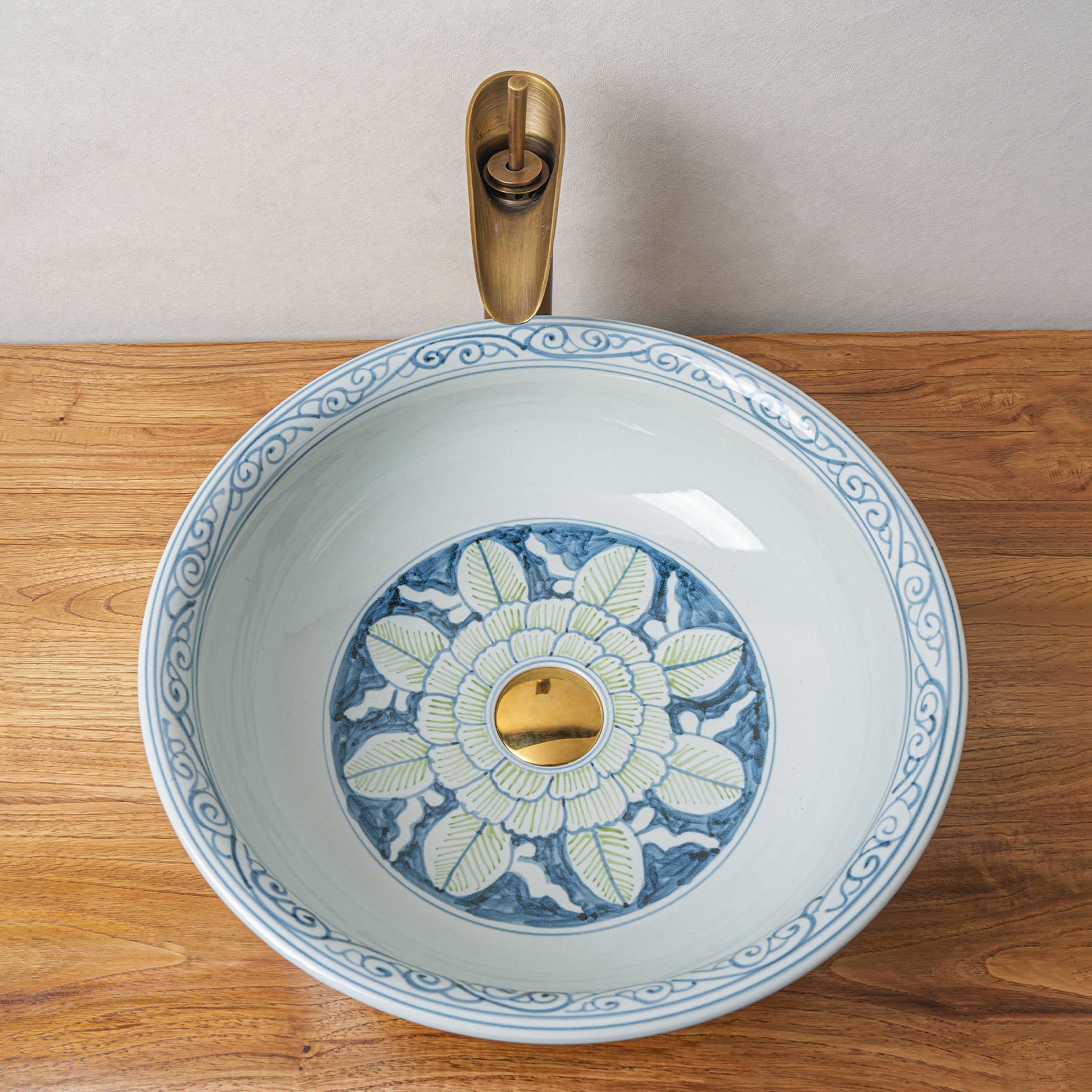 Round hand-painted ceramic washbasin