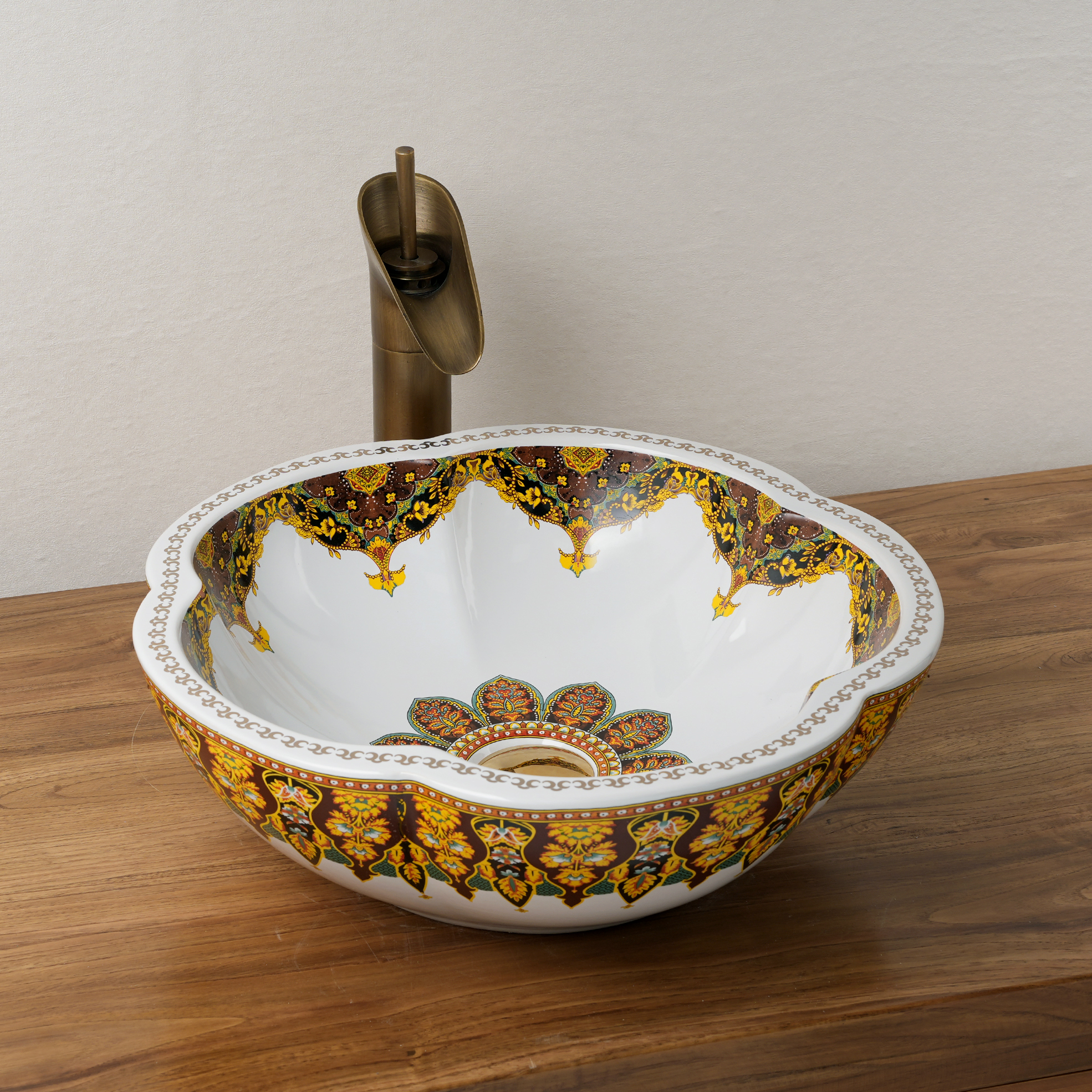 Ceramic washbasin with a yellow and white floral print