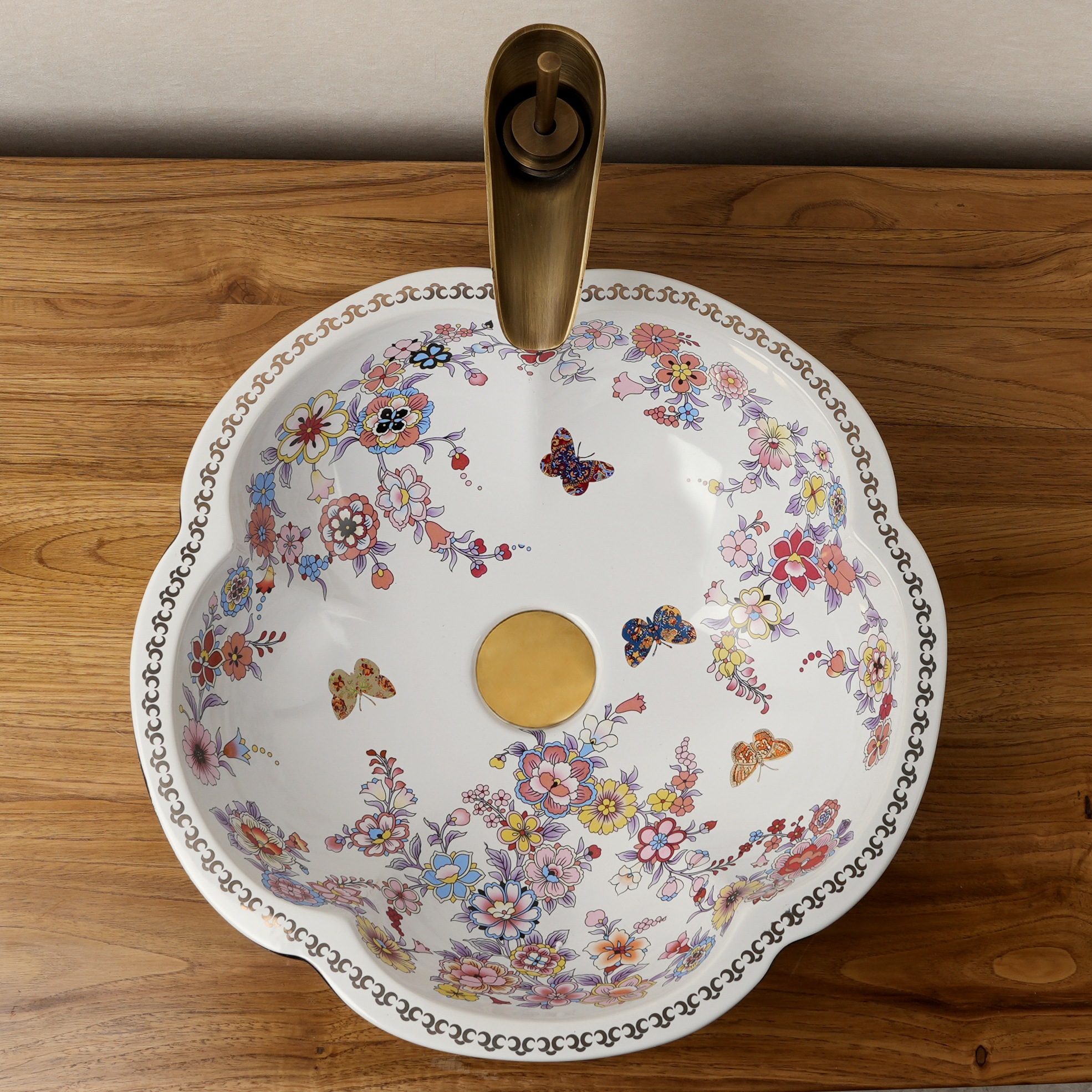 Ceramic washbasin with black and white floral print