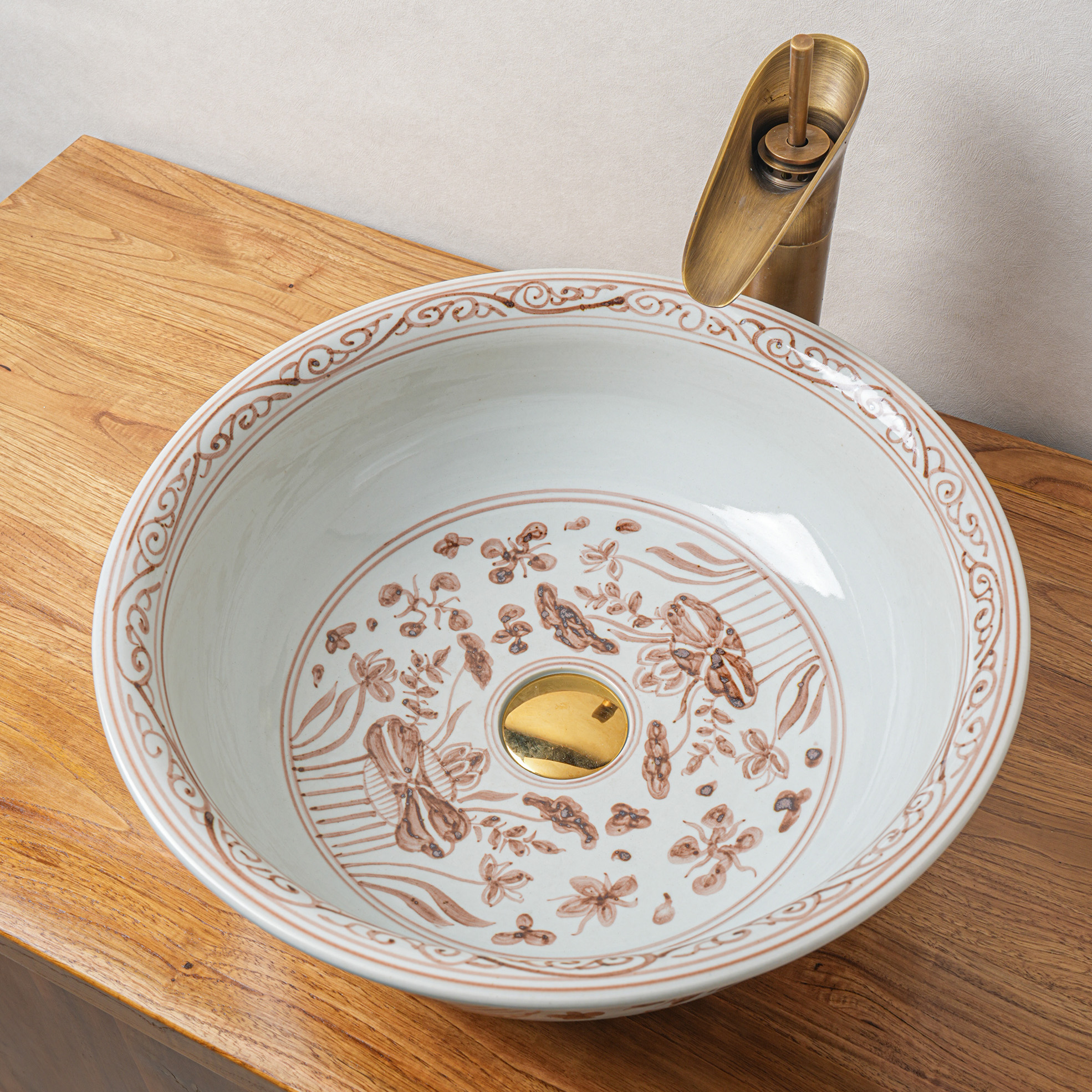 Round hand-painted ceramic washbasin