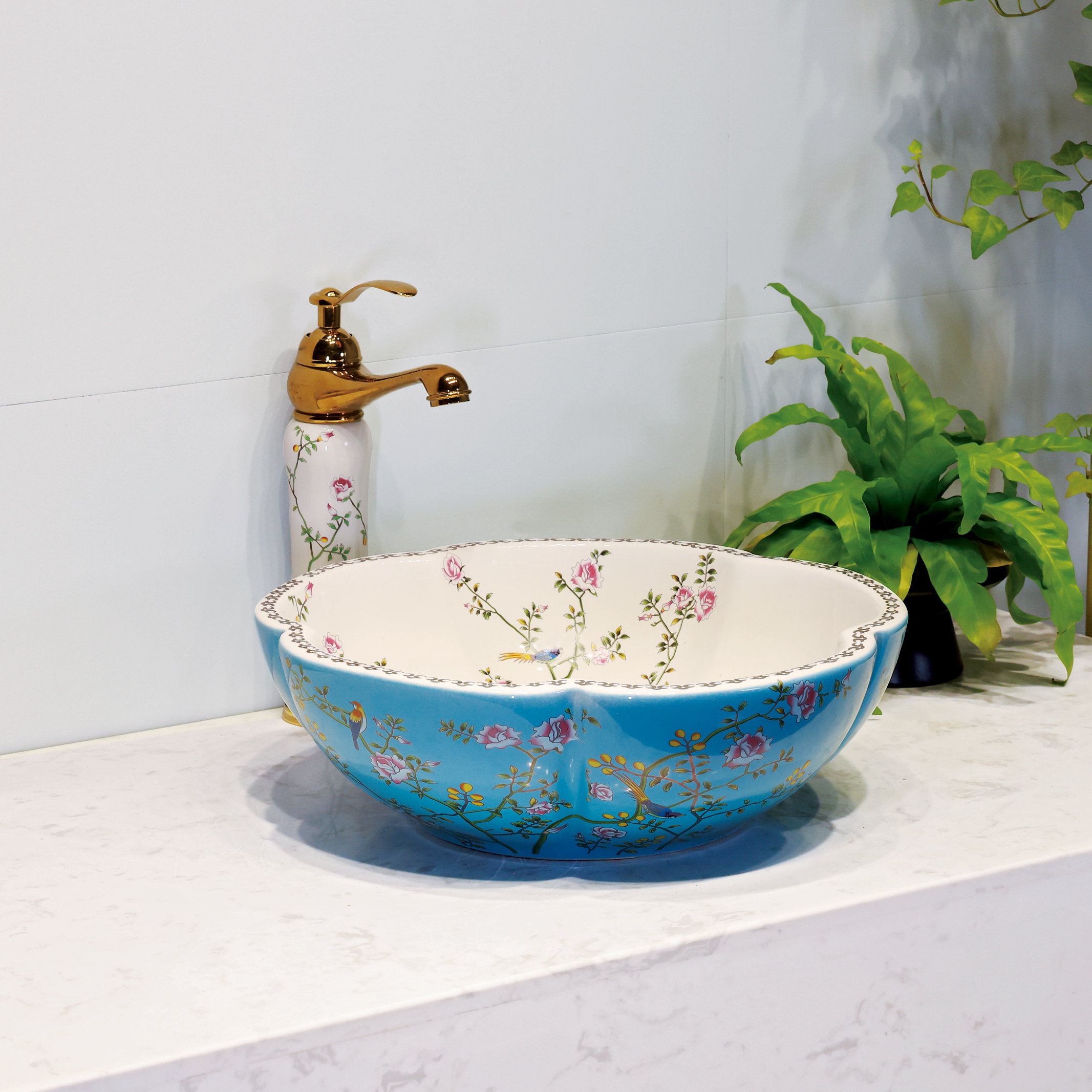 Ceramic washbasin with blue and white floral print