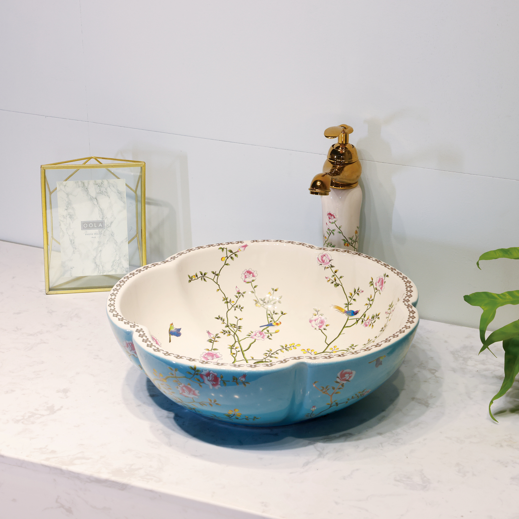 Ceramic washbasin with blue and white floral print