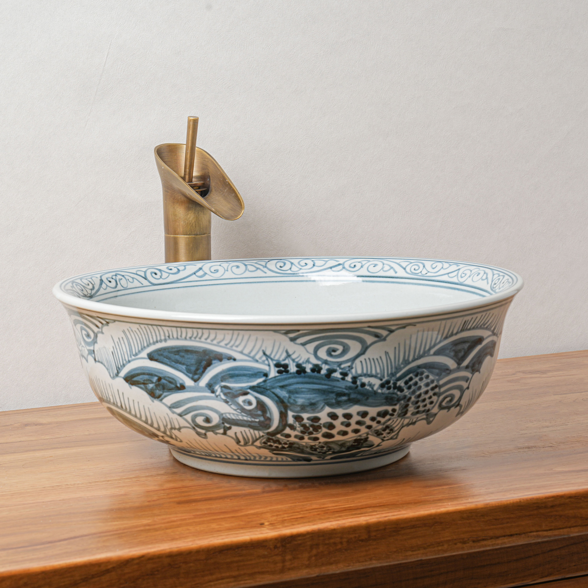 Round hand-painted ceramic washbasin