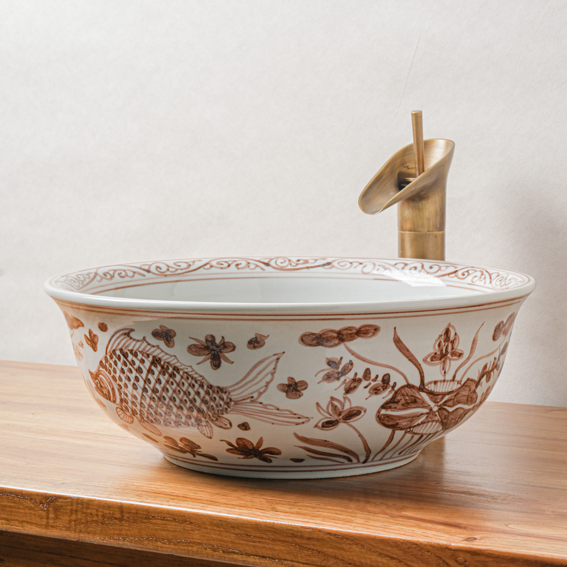 Round hand-painted ceramic washbasin
