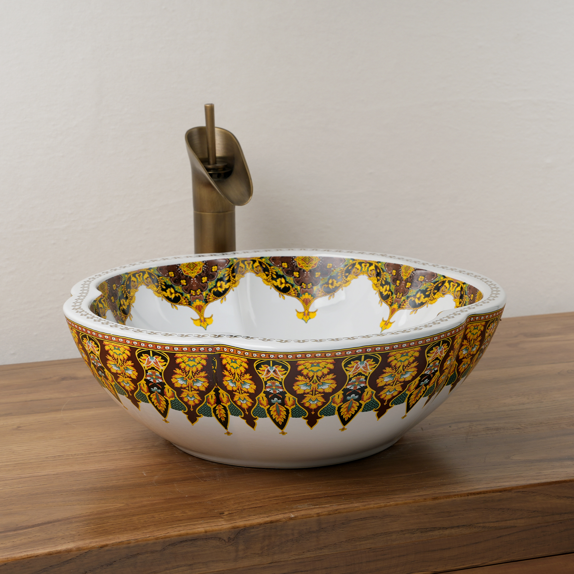 Ceramic washbasin with a yellow and white floral print