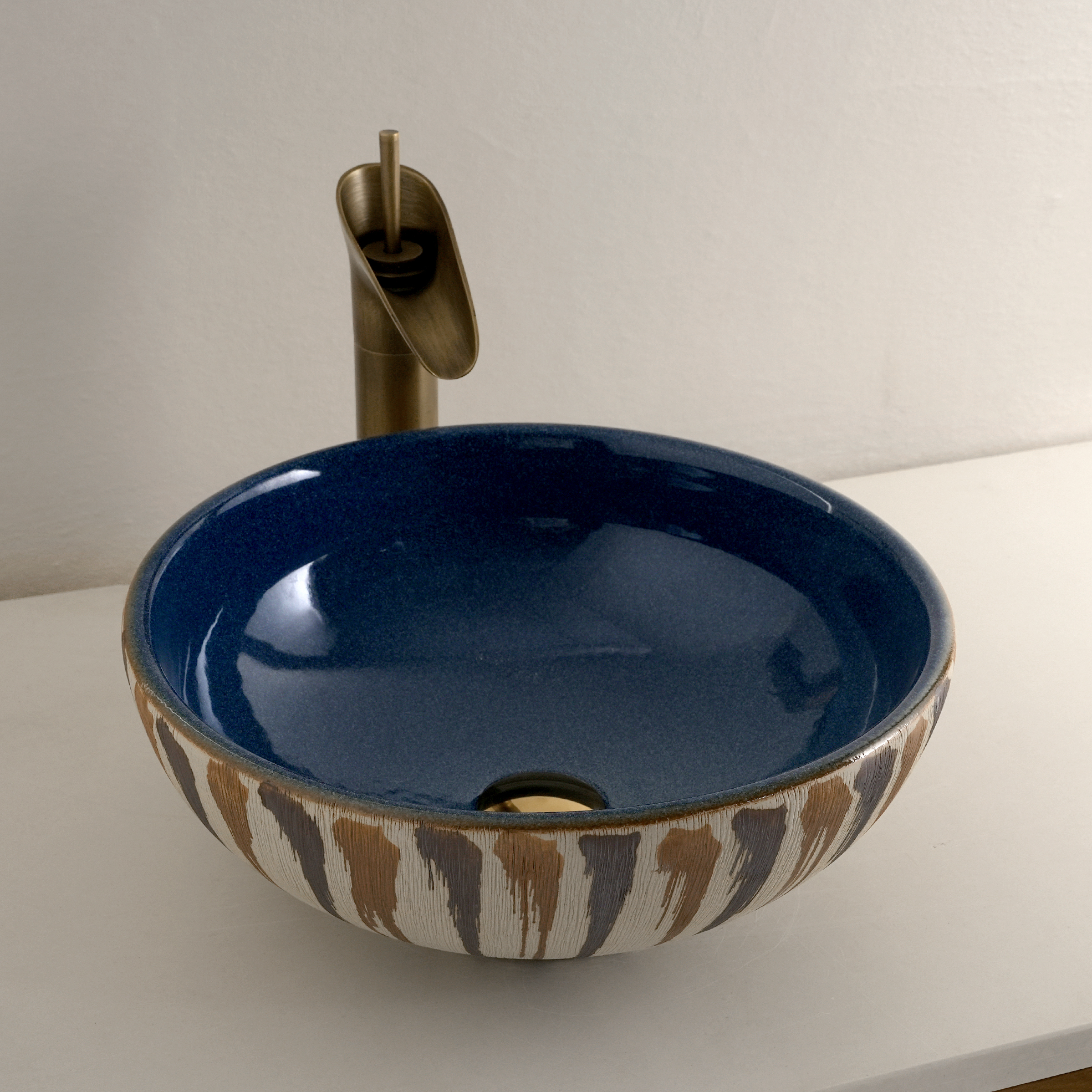 Blue graffiti-style washbasin