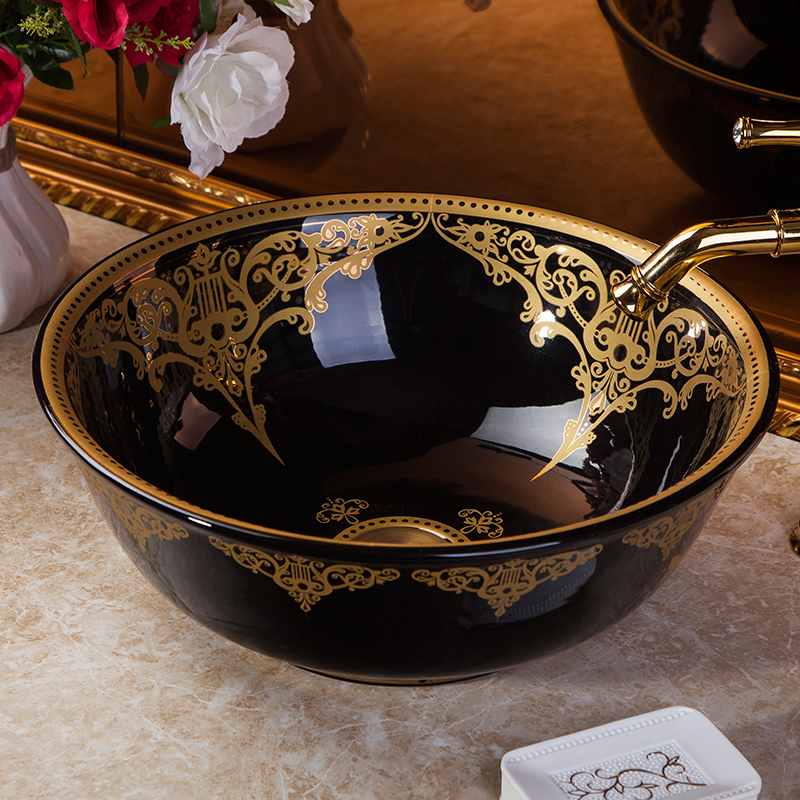Black and gold washbasin