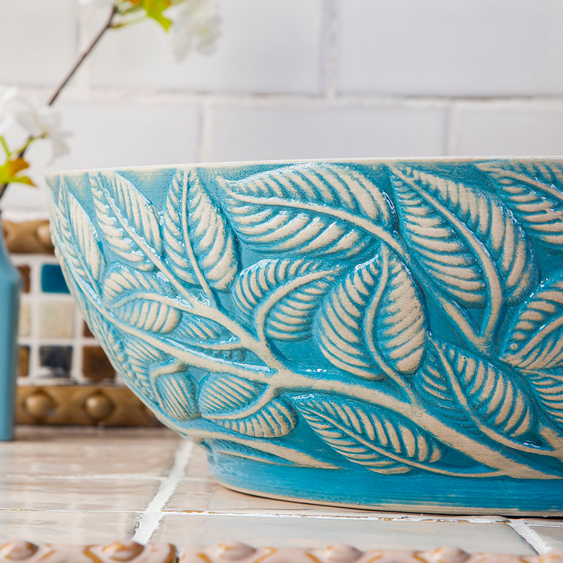 Washbasin with green leaf print