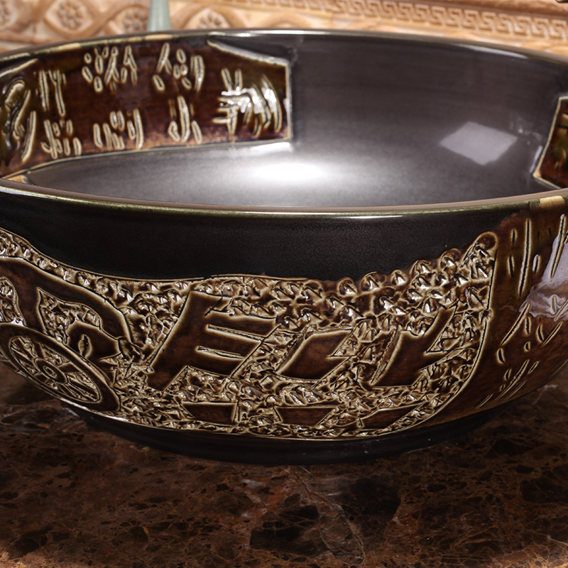 Carved brown washbasin