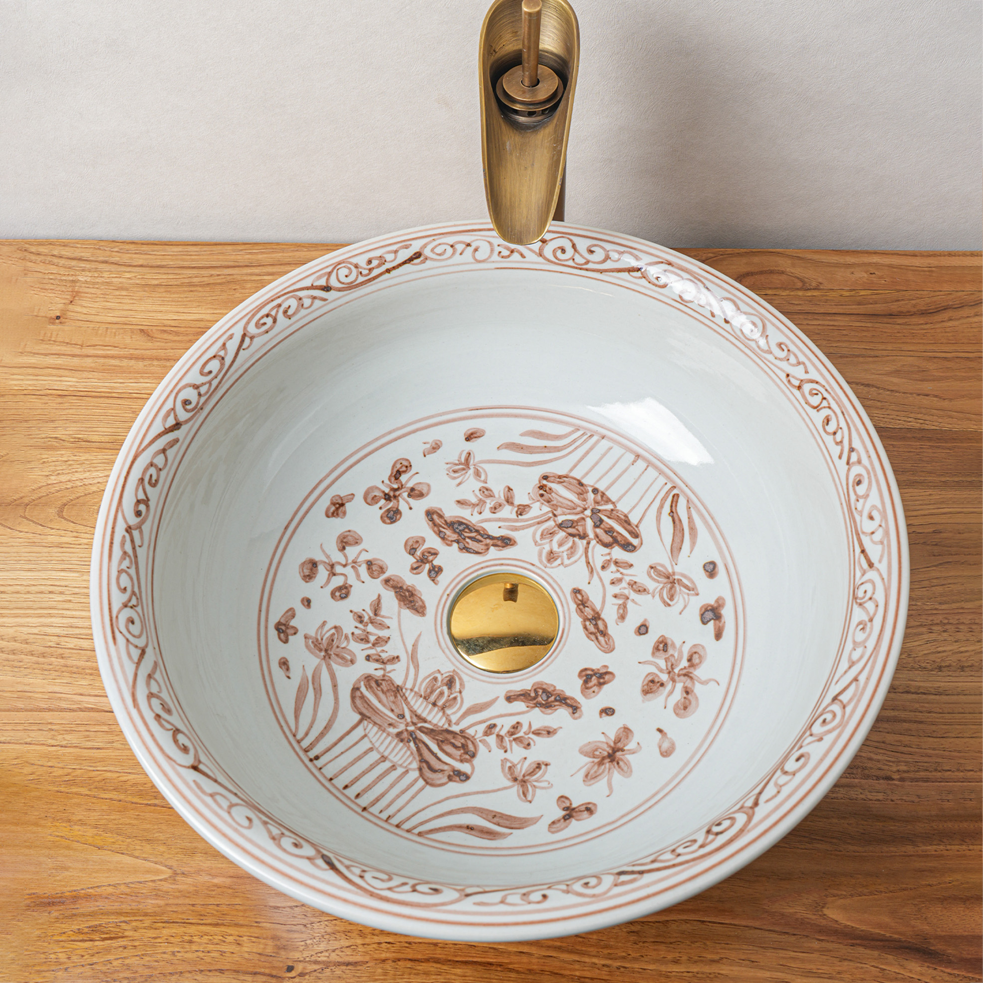 Round hand-painted ceramic washbasin