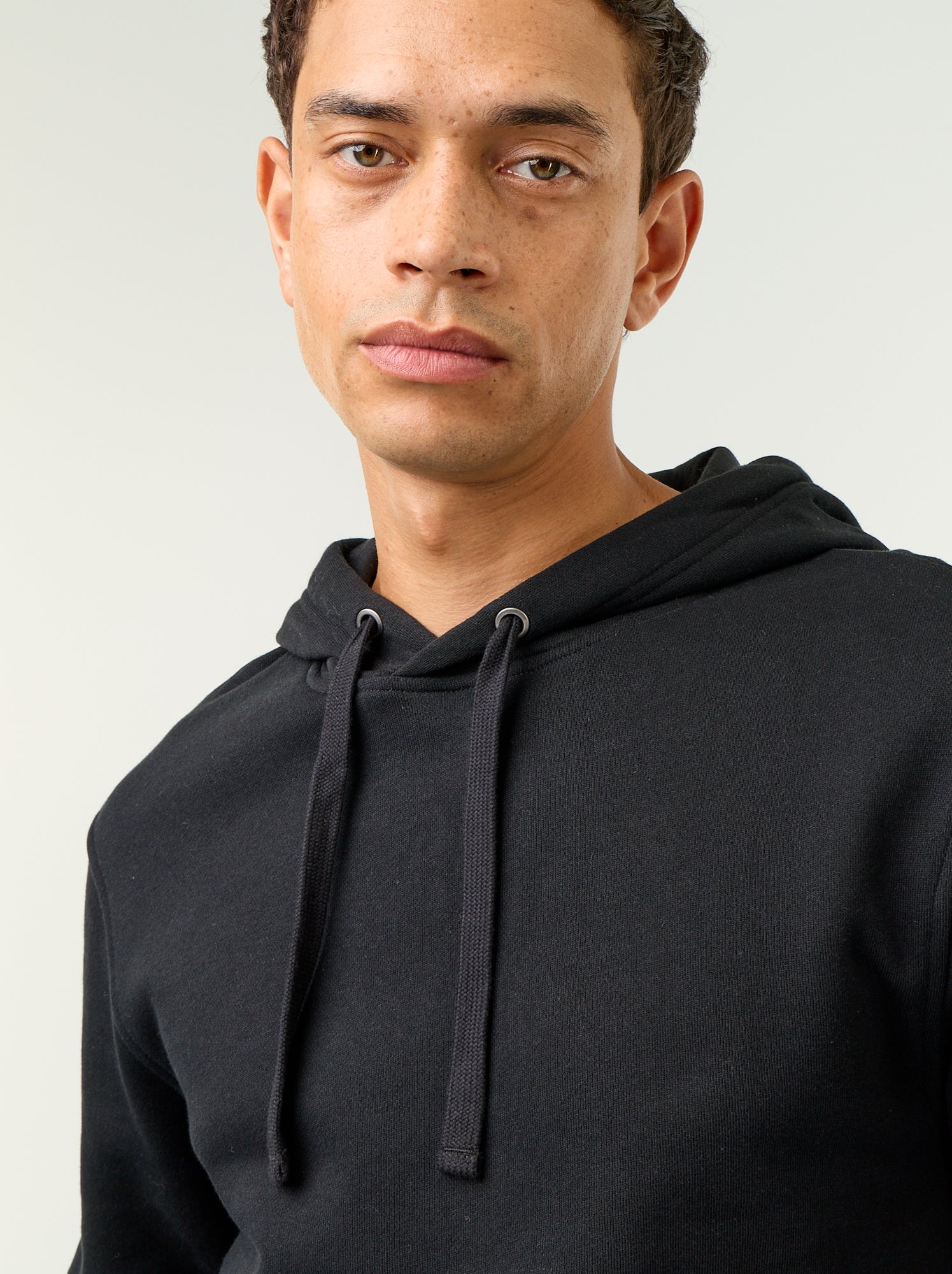 Sweat uni à capuche - Noir