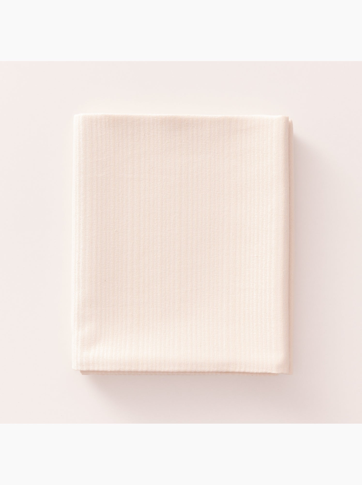 Nappe antitache avec tissu texturé à fines rayures - Gamusi. - Crème