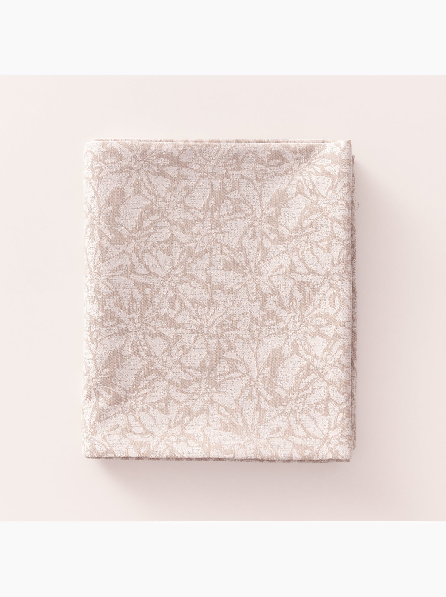 Nappe antitache avec tissu texturé floral - Gamusi. - Ocre