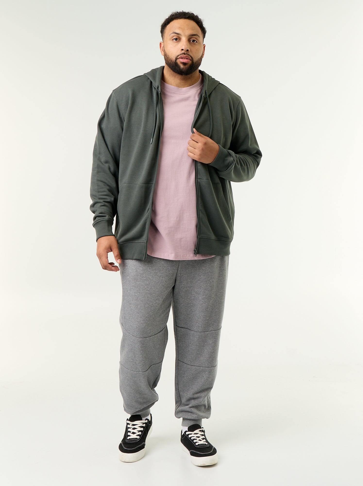 Pantalon de jogging avec bas resserré et poches zippées - Gris