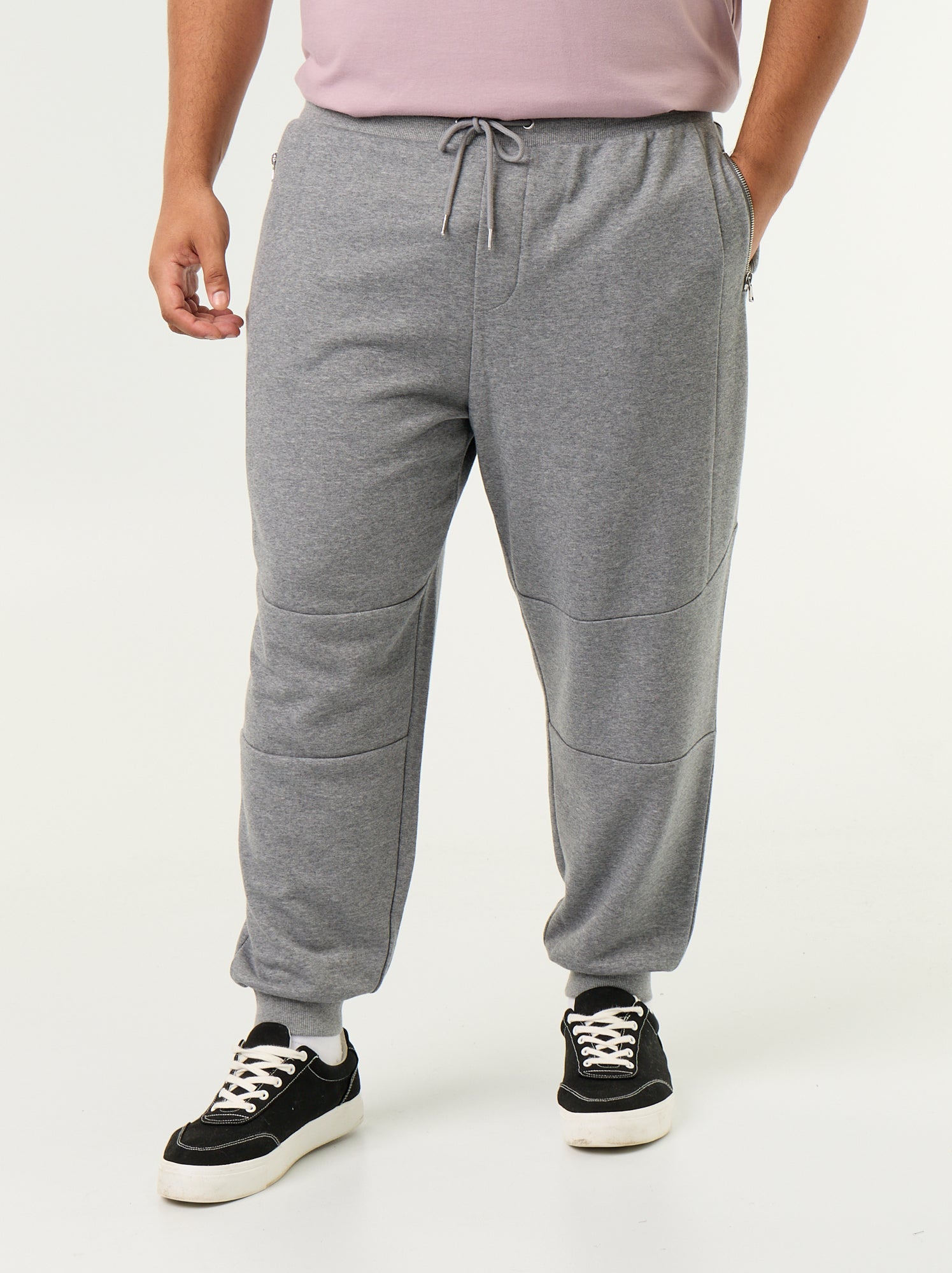 Pantalon de jogging avec bas resserré et poches zippées - Gris