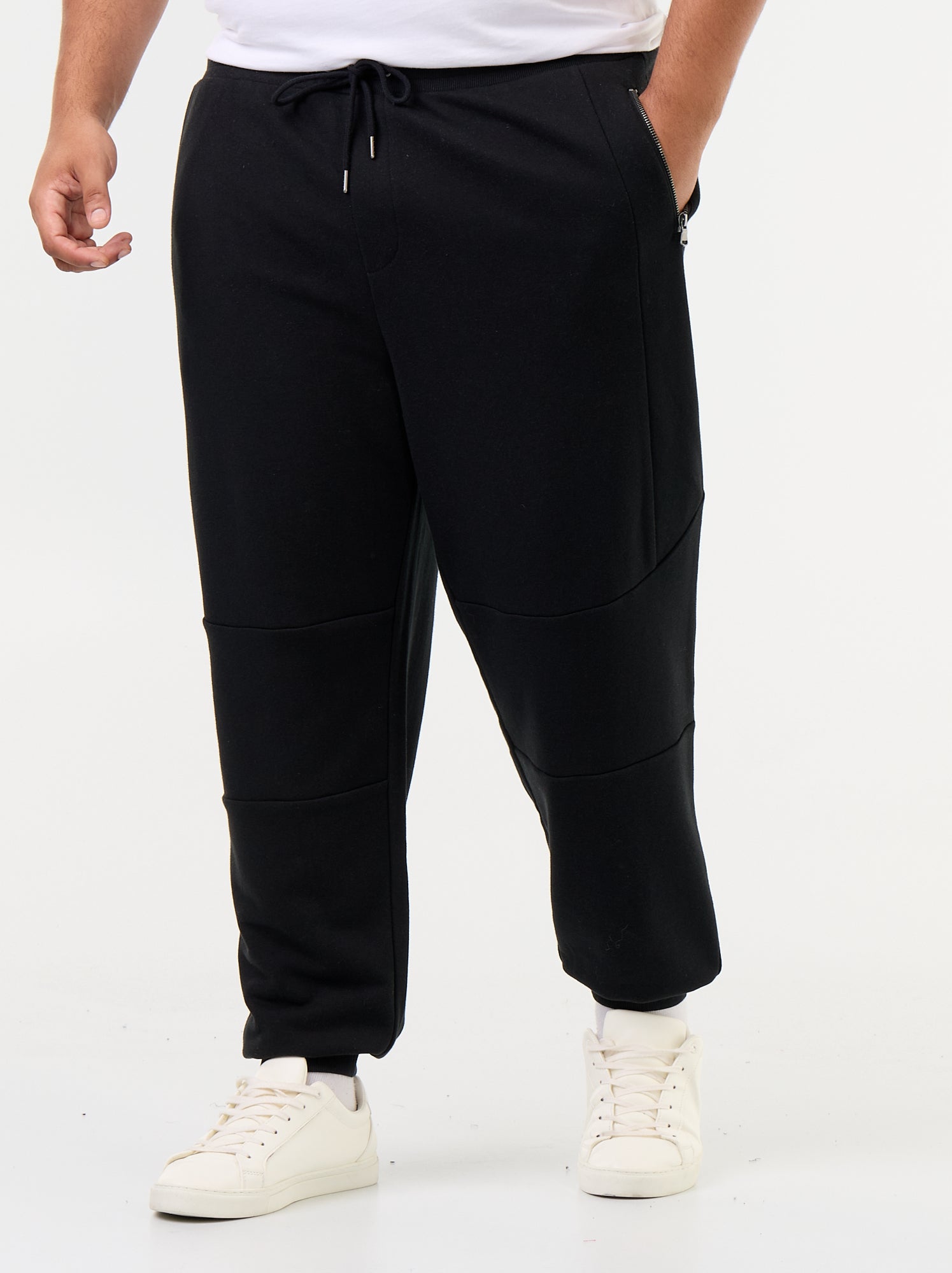Pantalon de jogging avec bas resserré et poches zippées - Noir
