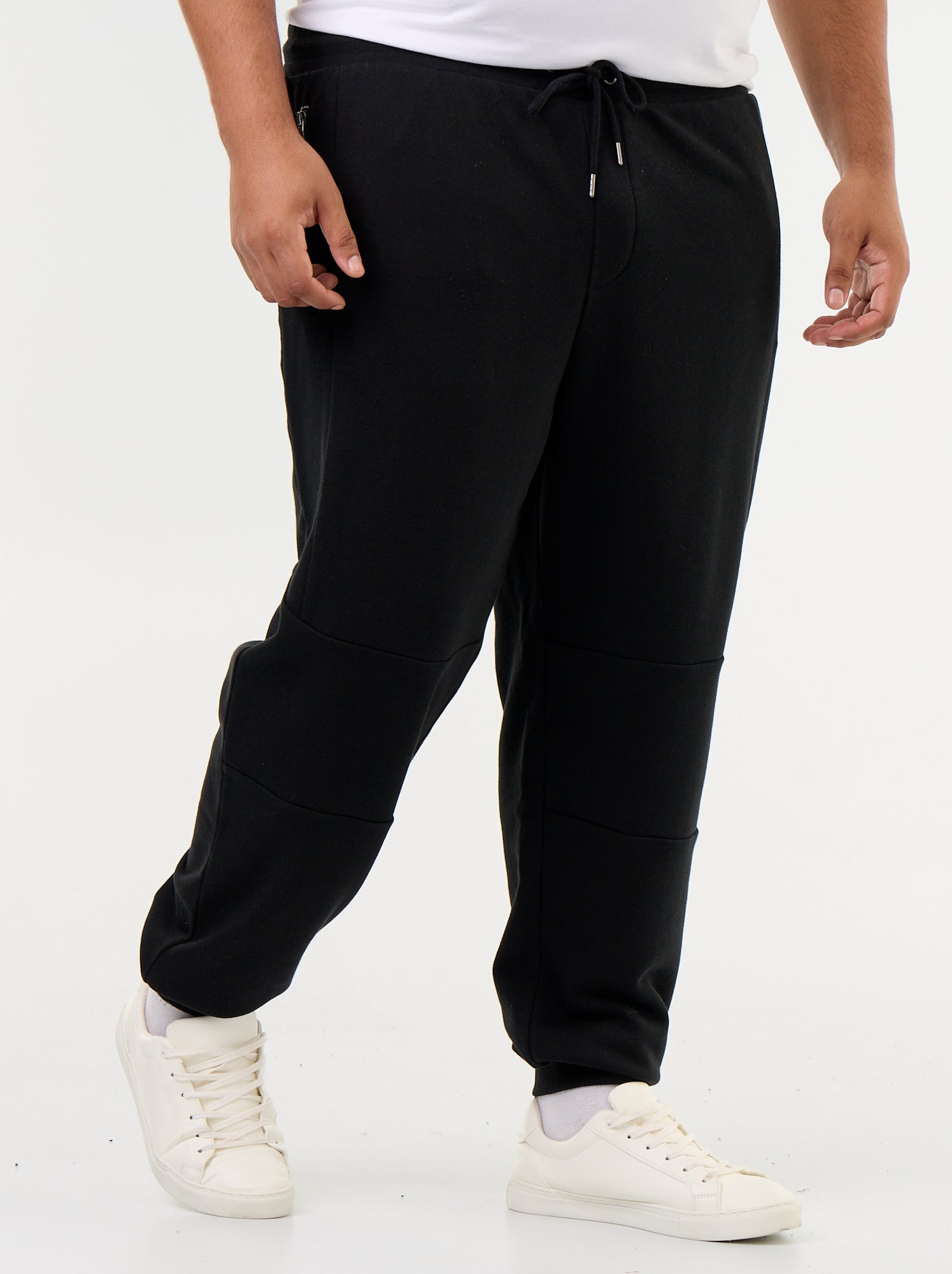 Pantalon de jogging avec bas resserré et poches zippées - Noir