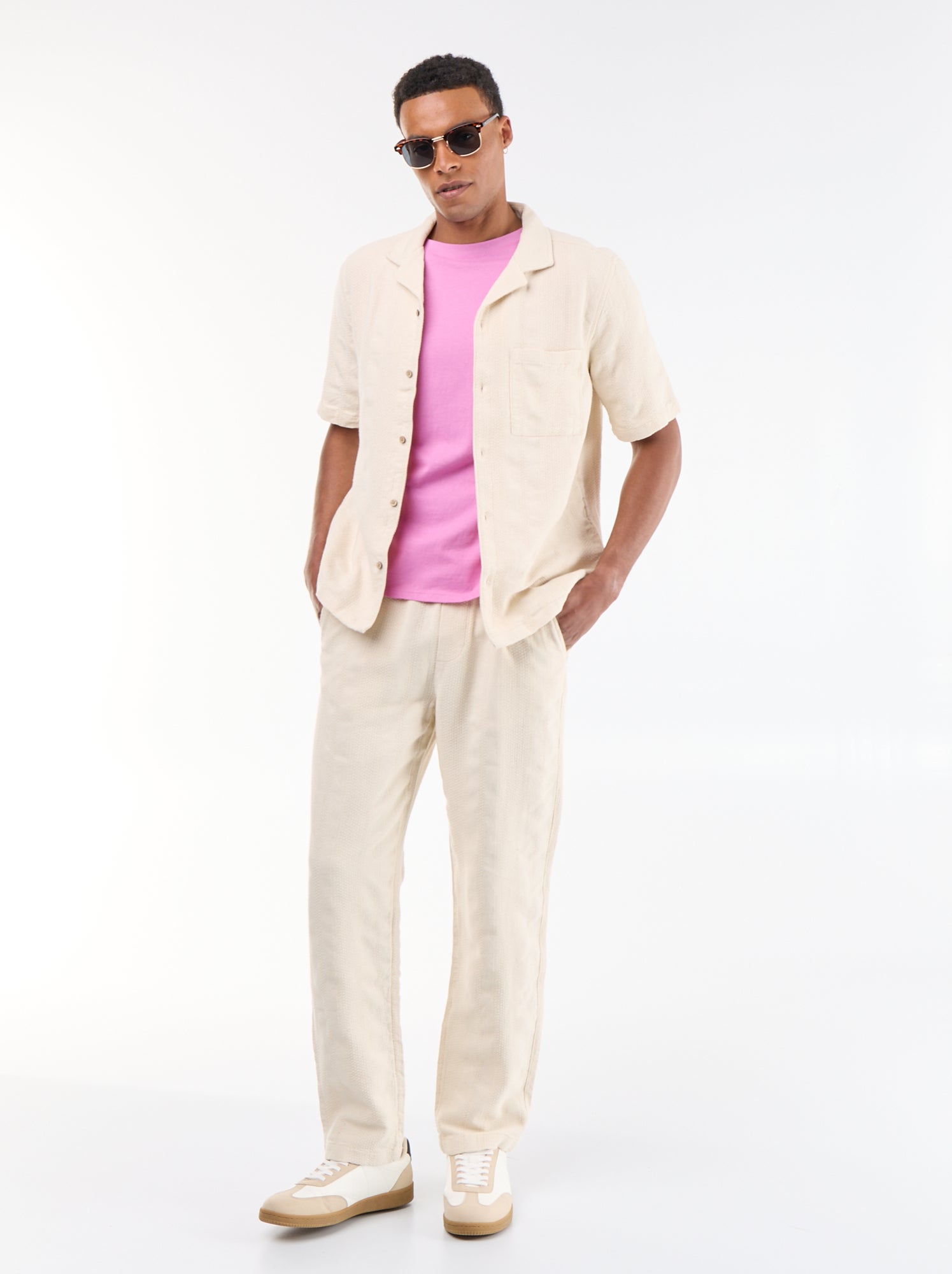 Pantalon uni en matière texturée - Beige