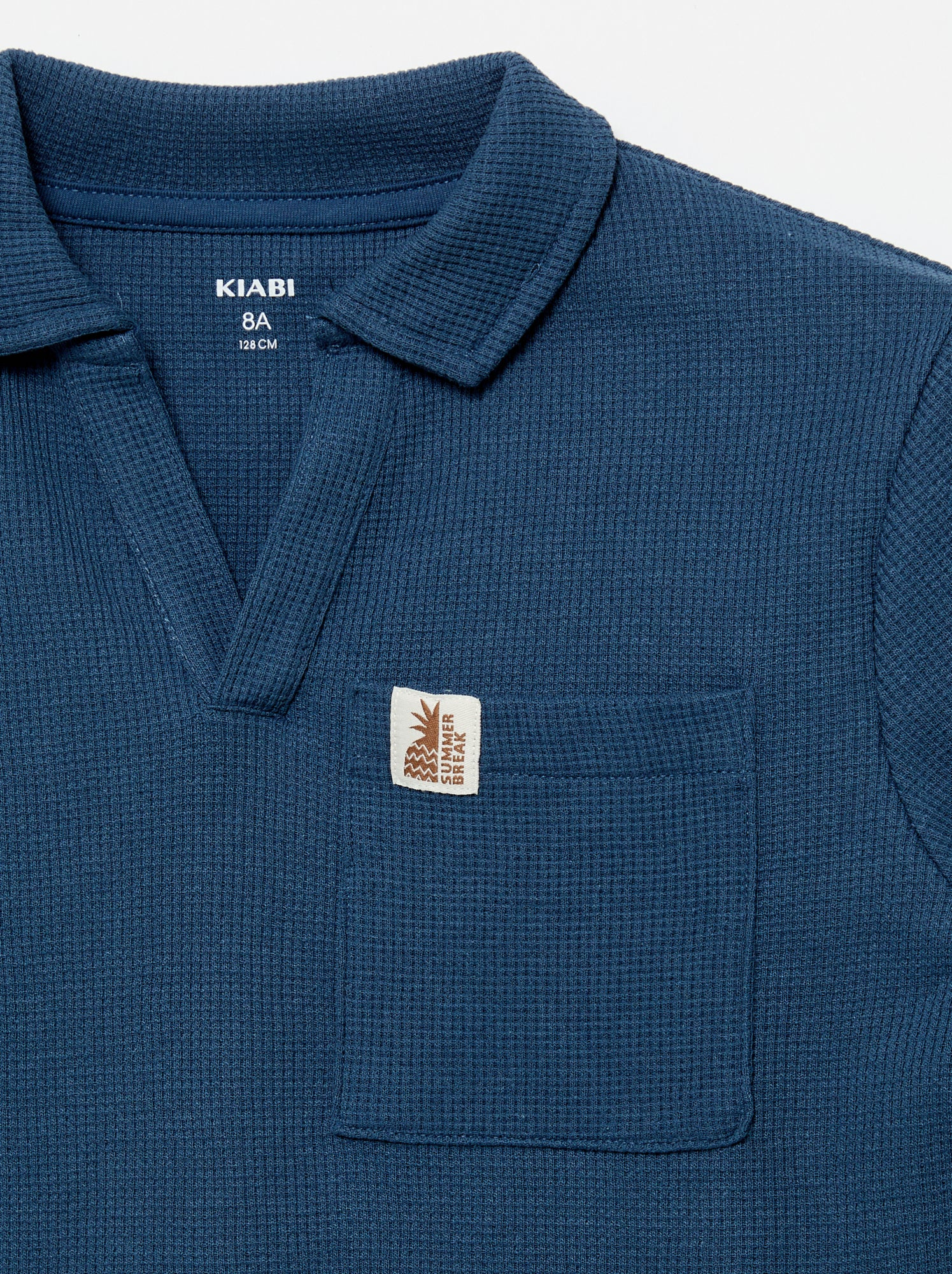 Polo en matière en nid d'abeilles - Bleu