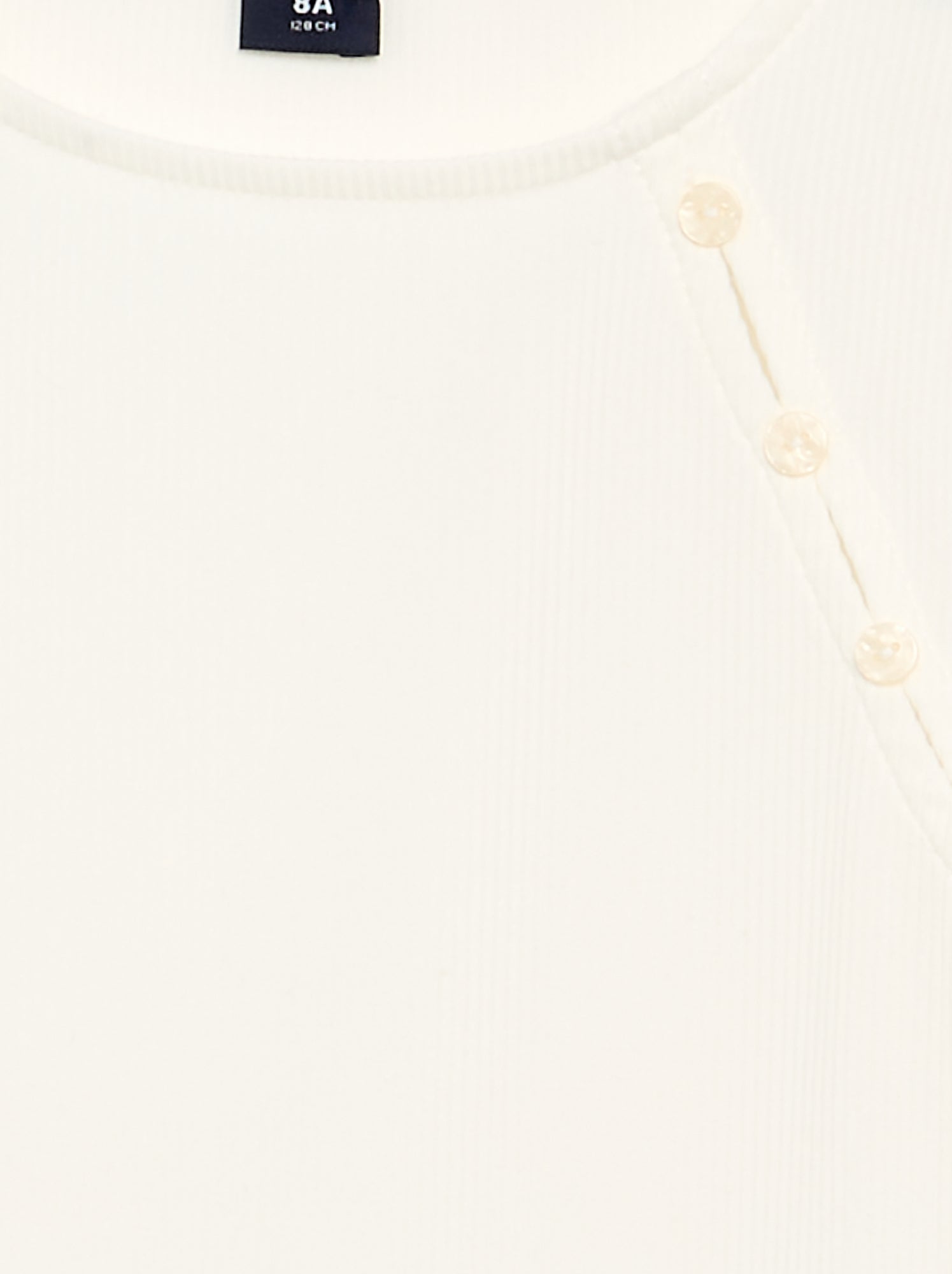 T-shirt uni en maille côtelée avec épaule boutonnée - Blanc