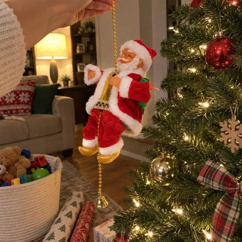 Red climbing Santa hanging beside a family Christmas tree
